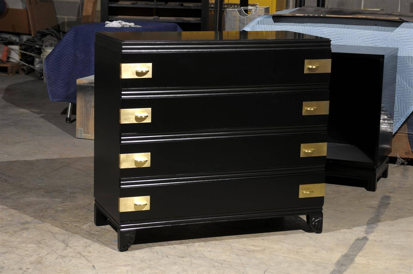 An elegant, rare four (4) drawer chest by Widdicomb (Series number 1110) introduced in 1938. Gorgeous, expertly crafted mahogany case construction with wonderful lines and fabulous foot detail.  The drawers are marked with sublime solid brass