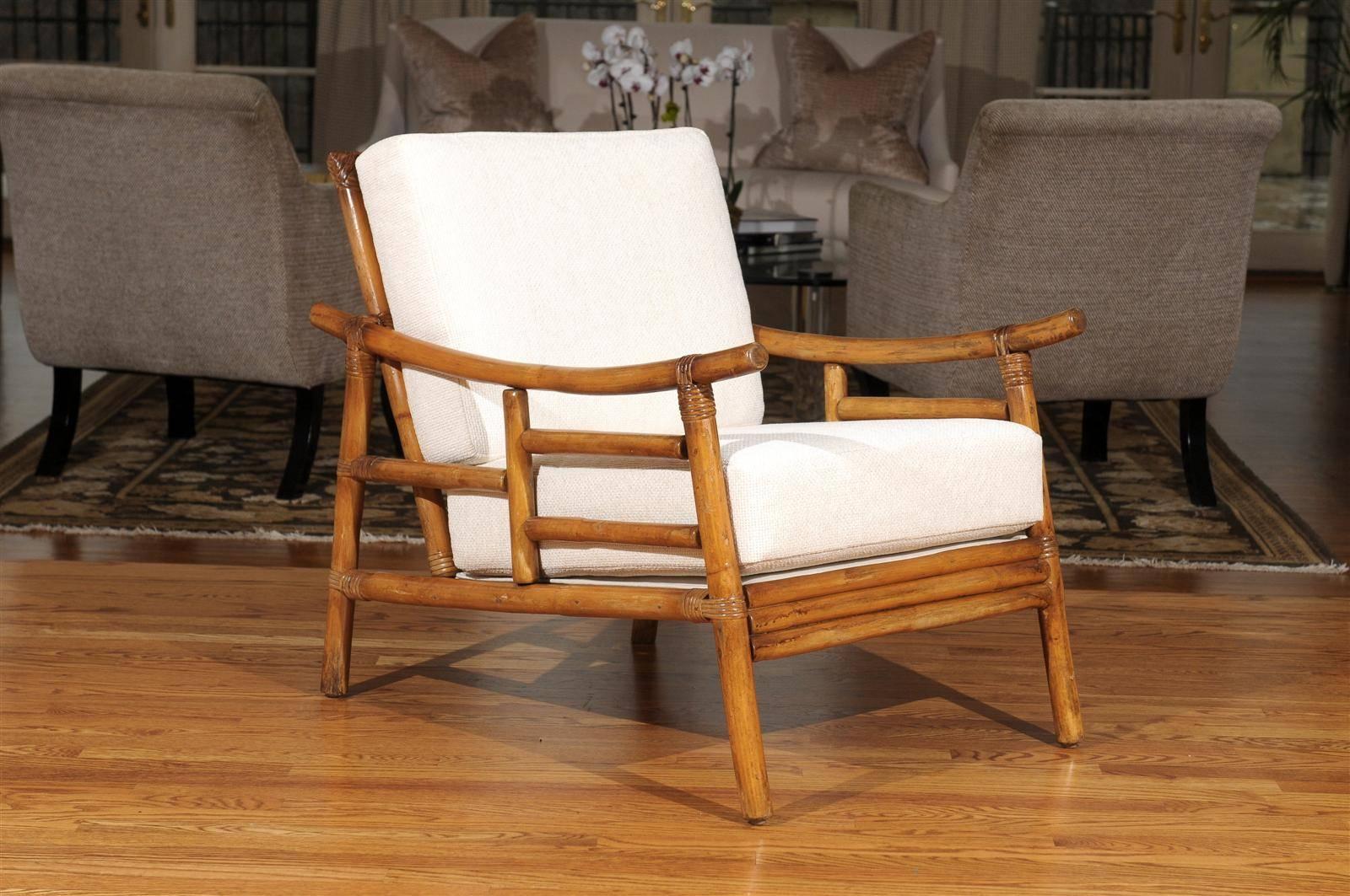 An exceptional pair from a difficult to find series of Campaign style chairs.  Rattan and hardwood construction with beautiful raffia binding detail.  Stout, comfortable and expertly made.  Aged to absolute perfection !  These unusual pieces were a
