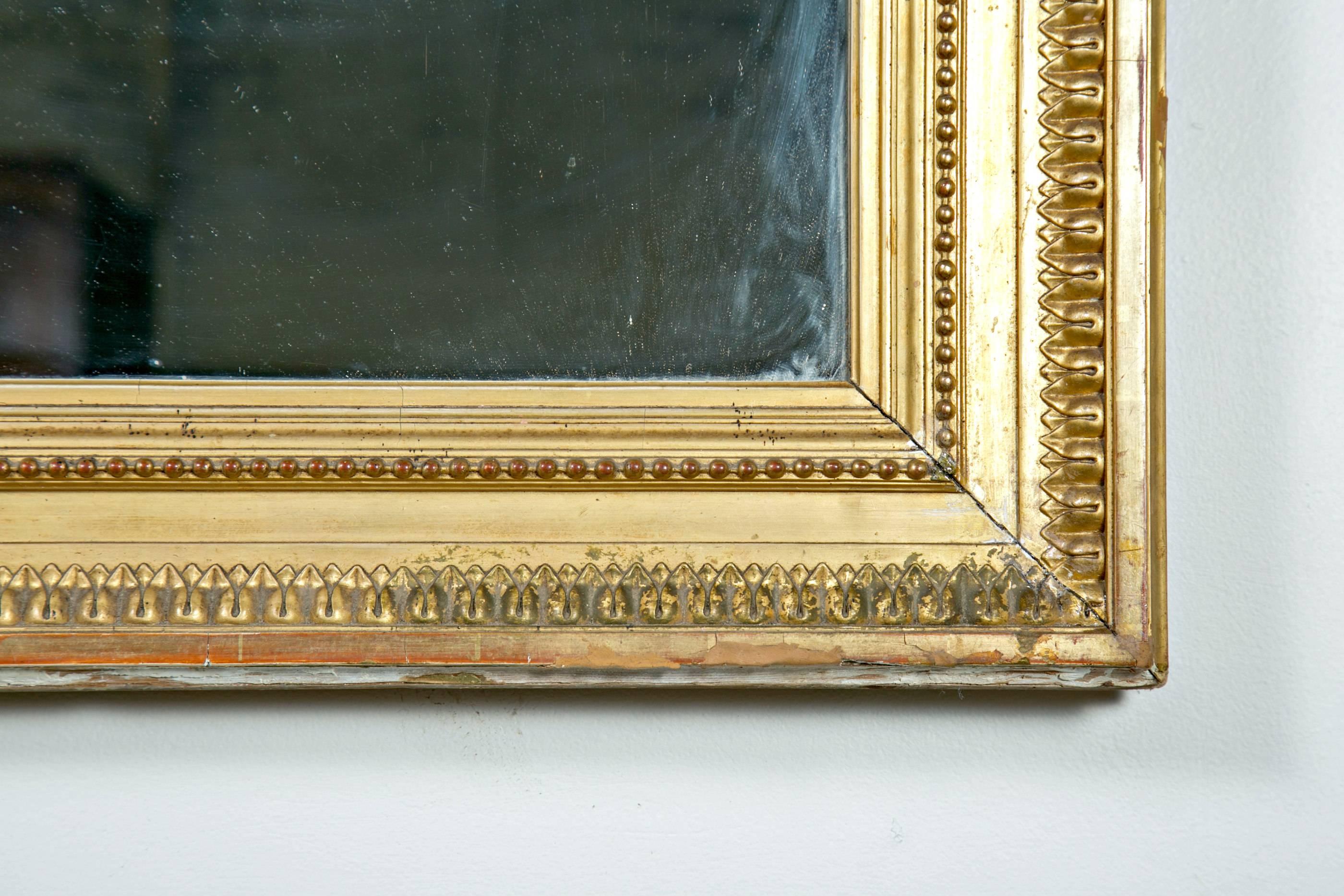 French Louis XVI Style Carved Giltwood Mirror, circa 1820s 4