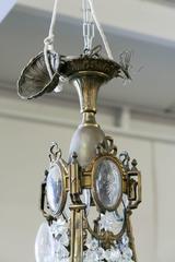 19th Century French Louis XVI Style Bronze and Crystal Twelve-Light Chandelier