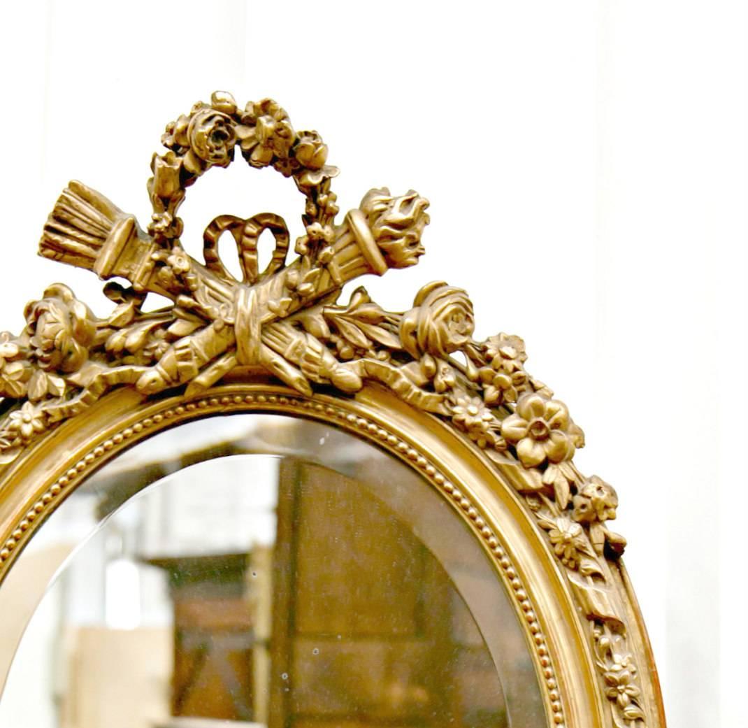 Late 19th Century 19th Century French Louis XVI Style Carved Oval Giltwood Mirror