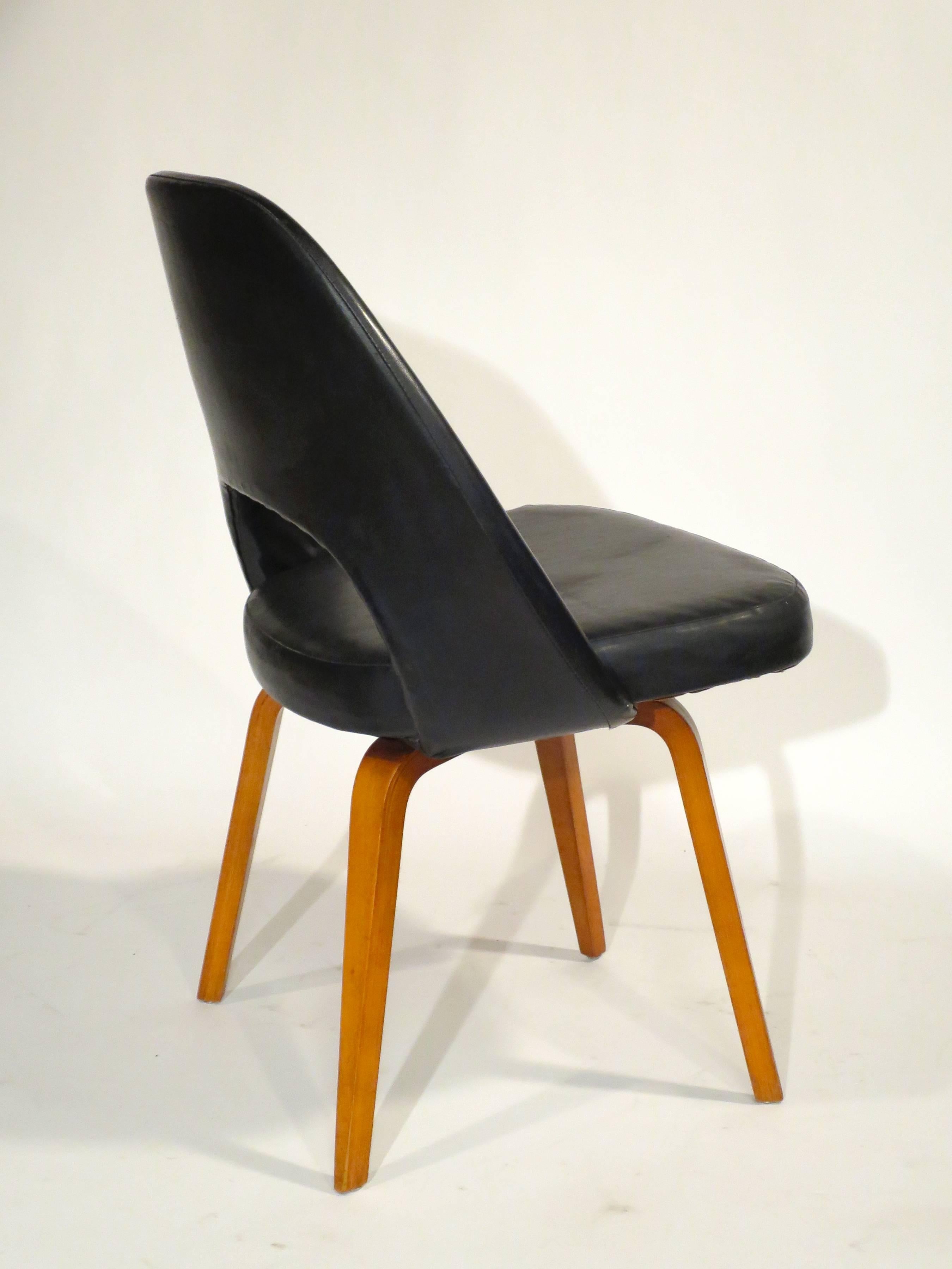Early Eero Saarinen side chair with wooden legs. Manufactured by Knoll, circa 1950s. 

Complimentary U.S. shipping.