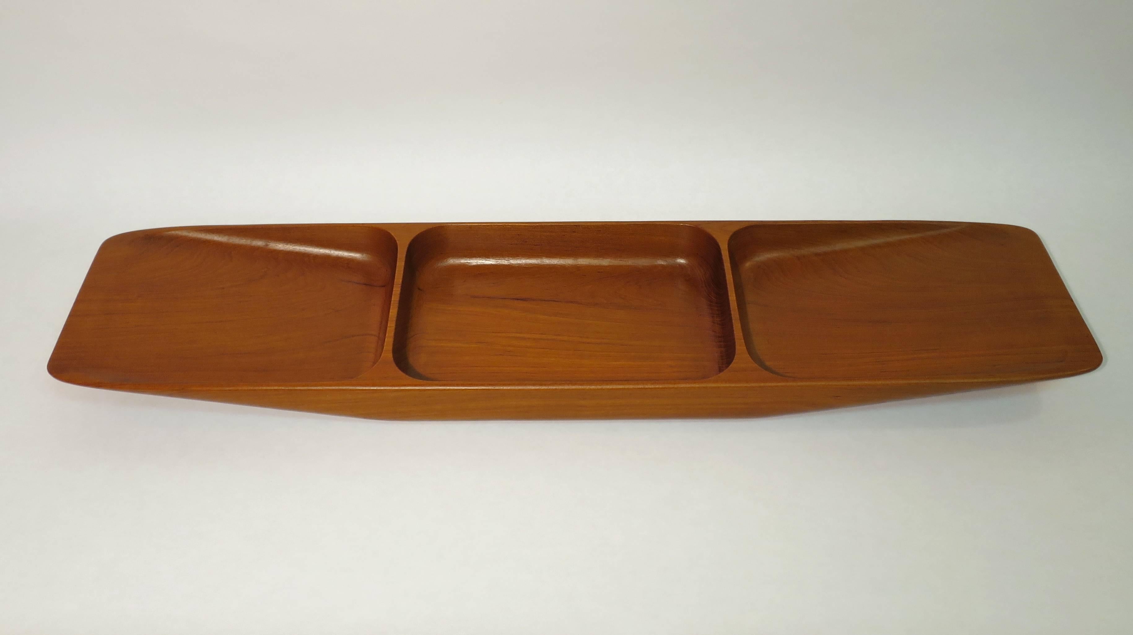 Large solid teak tray by Sowe Konst. Excellent condition. Measures: 30.75