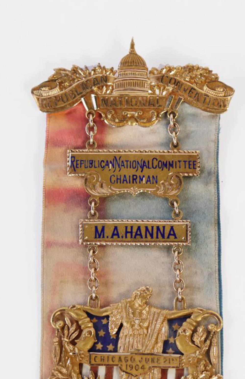 Mark Hanna’s 14-karat yellow gold and enamel chairman’s badge for the Republican National Convention, Chicago, June 21-23, 1904.

Made in anticipation of, or as a commemorative medal for Mark Hanna, as he died in February of 1904, before the