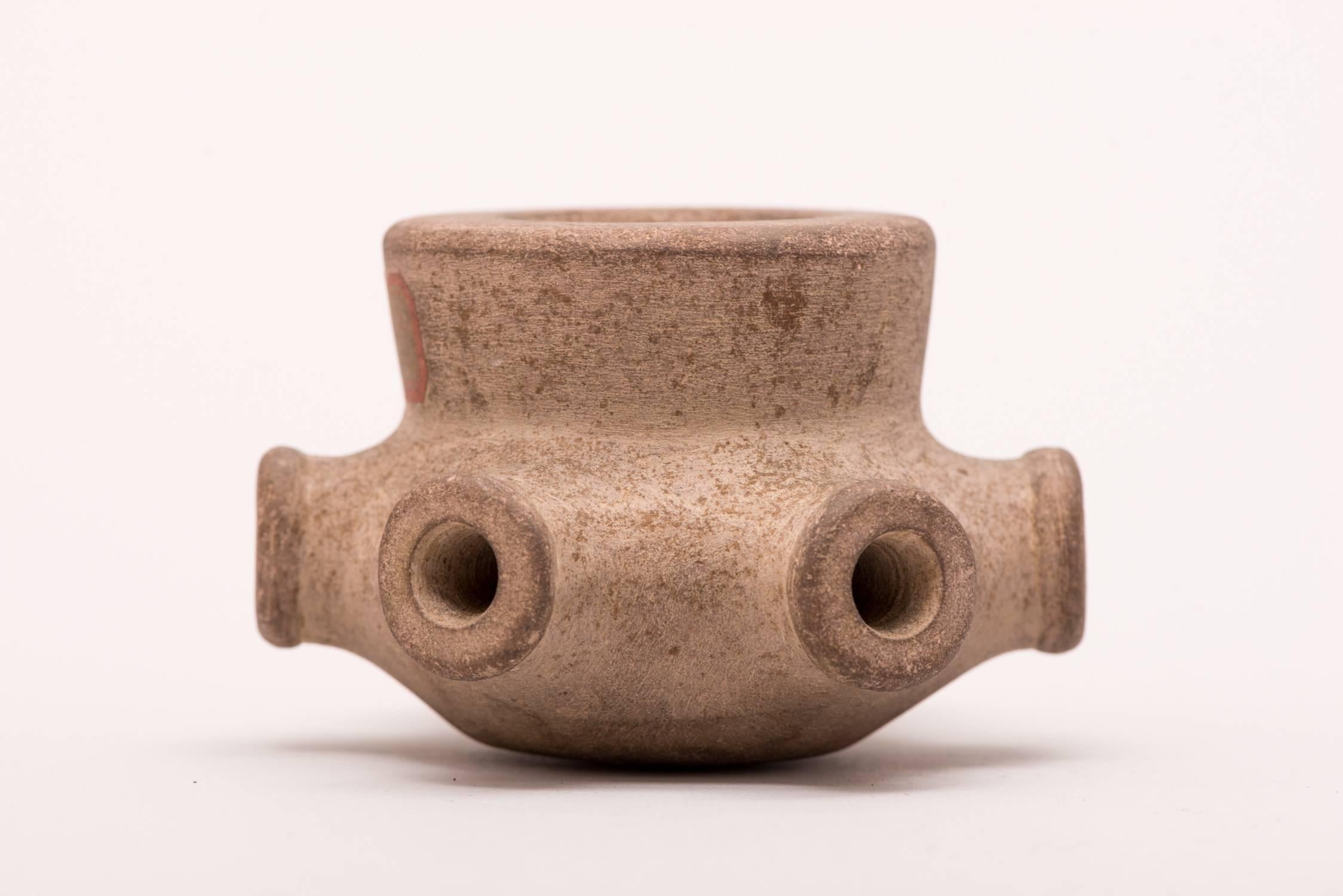 Cherokee circular peace or Chief’s pipe.

Region/tribe: Southeast, Tennessee/Cherokee.

Circa: Pre contact/southeast mound culture.

Materials: White Sandstone.

Dimensions: Diameter 3 3/4” by Height 2 1/2”.

Condition: Excellent. Rich