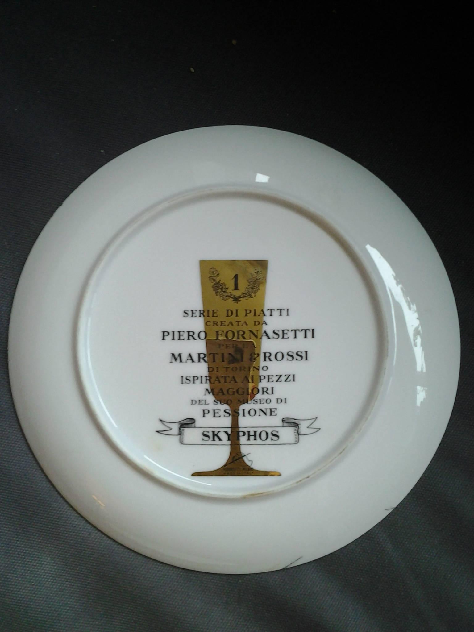 Piero Fornasetti (1913-1988). Four dishes in original box made in limited edition for Martini & Rossi with decor inspired pieces from Martini Museum.
Diameter 23.00 cm. 09.06 in.
Free shipping to London.
Document provided.