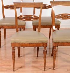 Set of Four Italian Neoclassical Carved Side Chairs