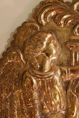 Pair of Continental Polished Brass Repoussé Two Light Sconces