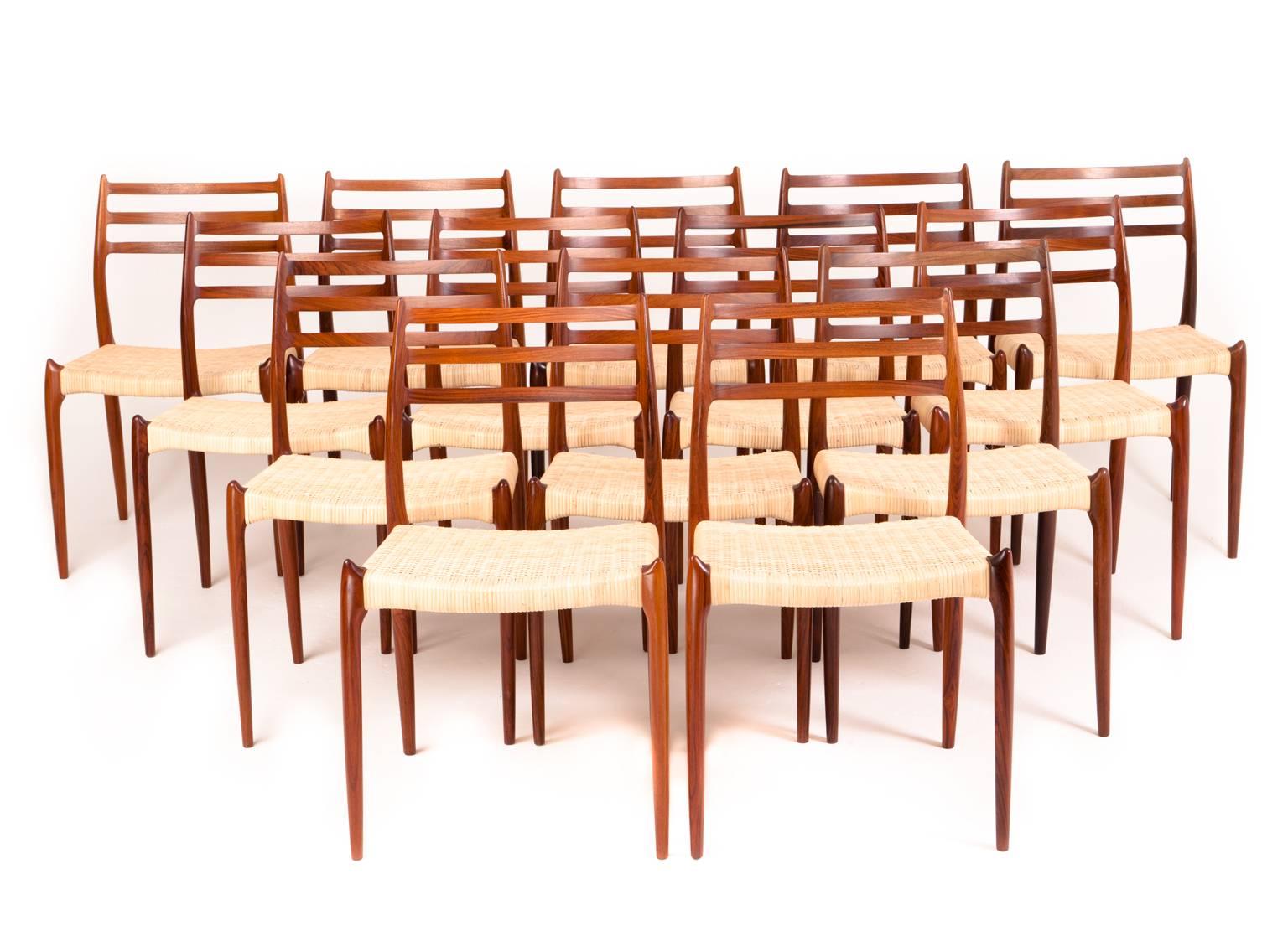Niels O. Møller

A set of 14 dining chairs with rosewood frame, seat with woven cane.
 
Model 78
Manufactured by J. L. Møllers Møbelfabrik
Designed 1962.
