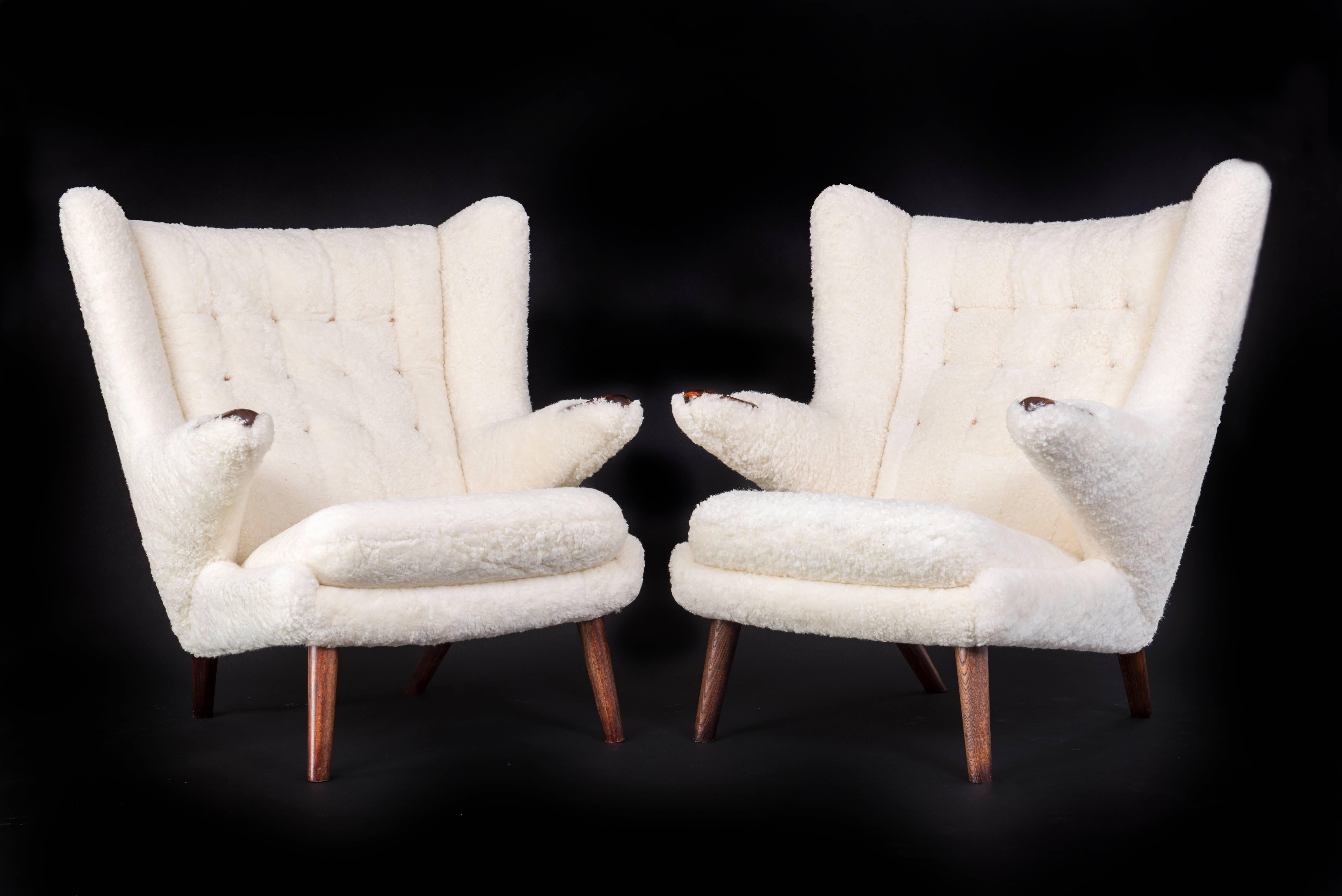 Danish Hans J. Wegner Pair of Papa Bear + Stool. Sheepskin and Rosewood