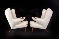 Hans J. Wegner Pair of Papa Bear + Stool. Sheepskin and Rosewood