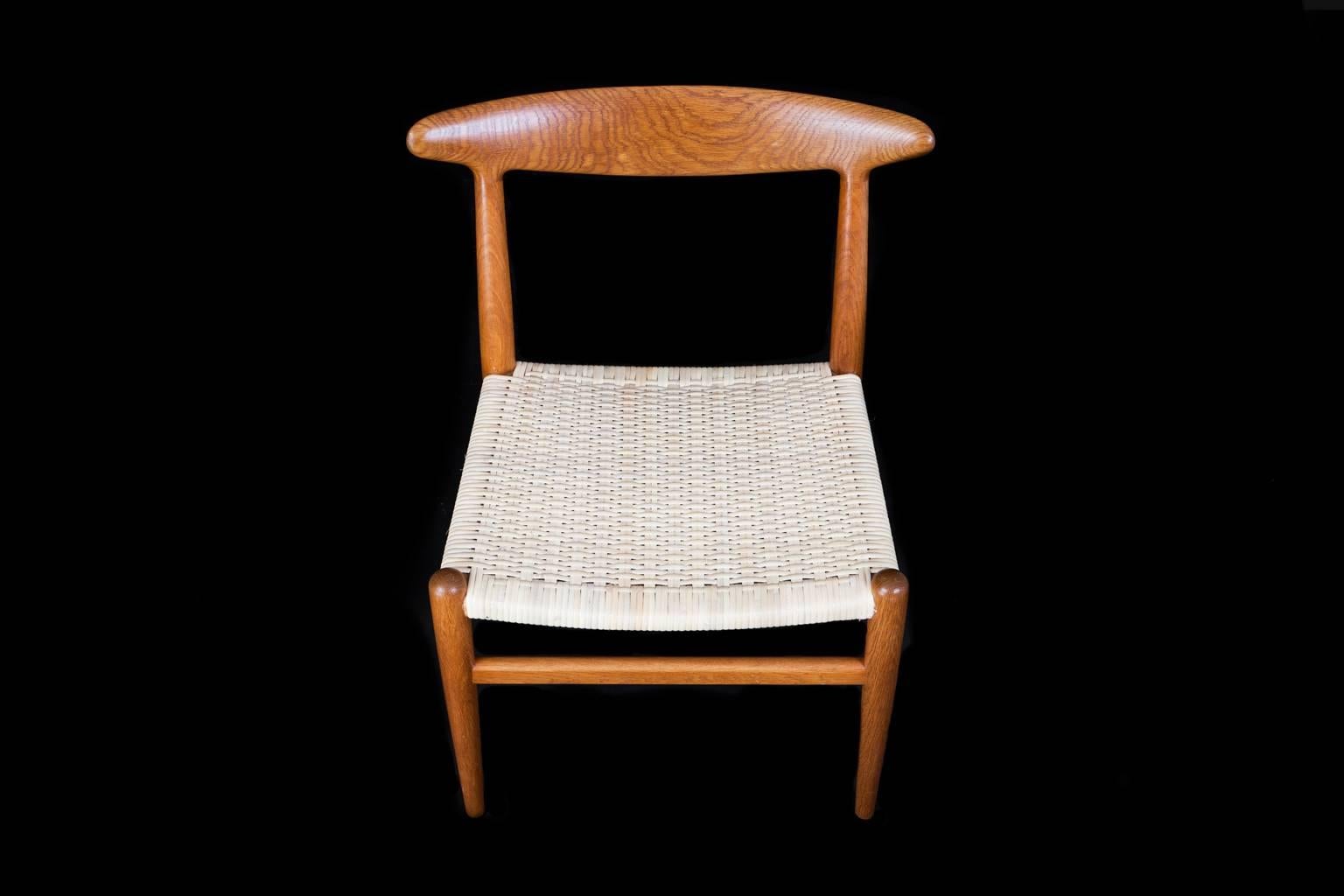 Hans J. Wegner Set of Six Dining Chairs Oak and Woven Cane In Excellent Condition In Copenhagen, DK