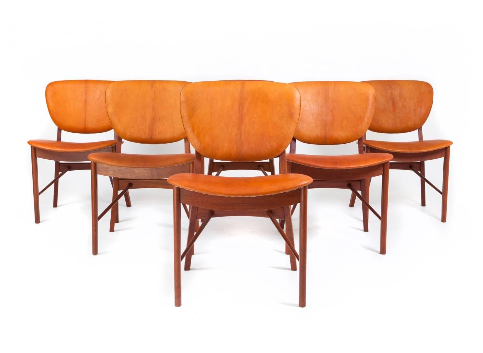 P. Vodder.

Set of six. Teak frame, seat and back with patinated natural leather.

Produced by master cabinetmaker Niels Vodder.

  