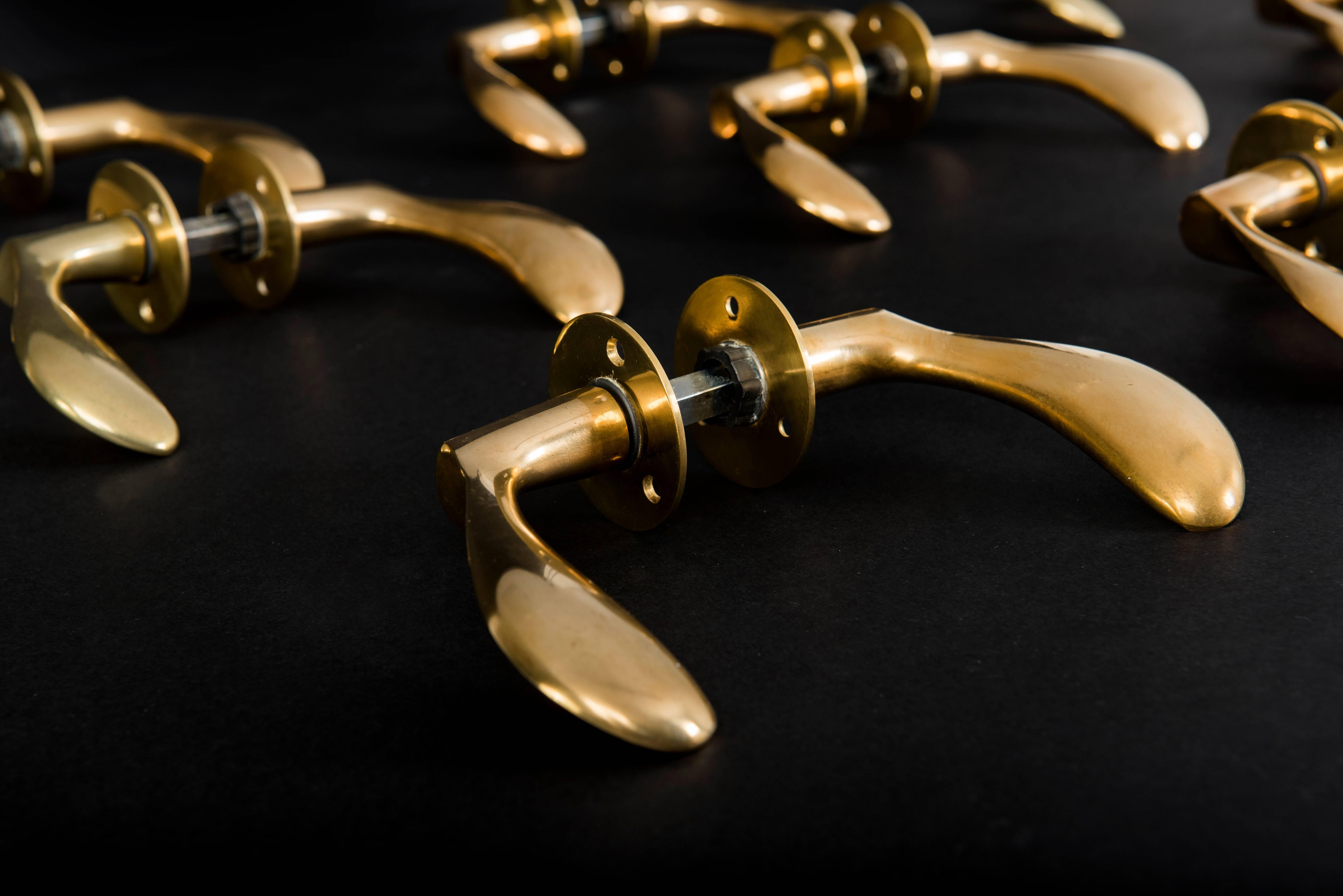 Danish Arne Jacobsen Set of 12 Brass Door Handles For Sale
