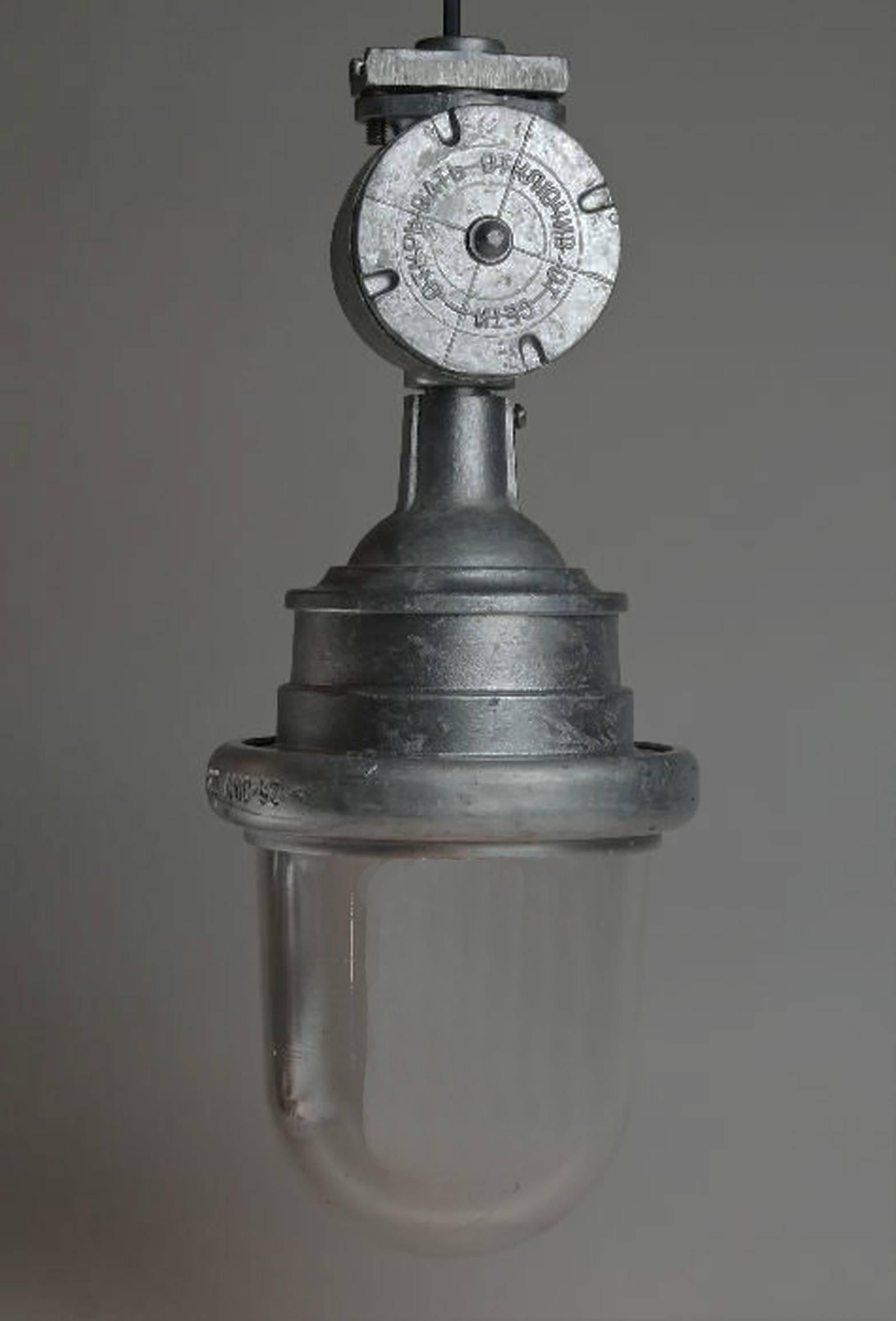 Soviet Industrial pendants/lamps with aluminum top and heavy glass from the 1970s.
Marked CCCP.
Dimensions: Ø. 21cm, H. 52cm, about 7kg.
Up to 22 pieces available.