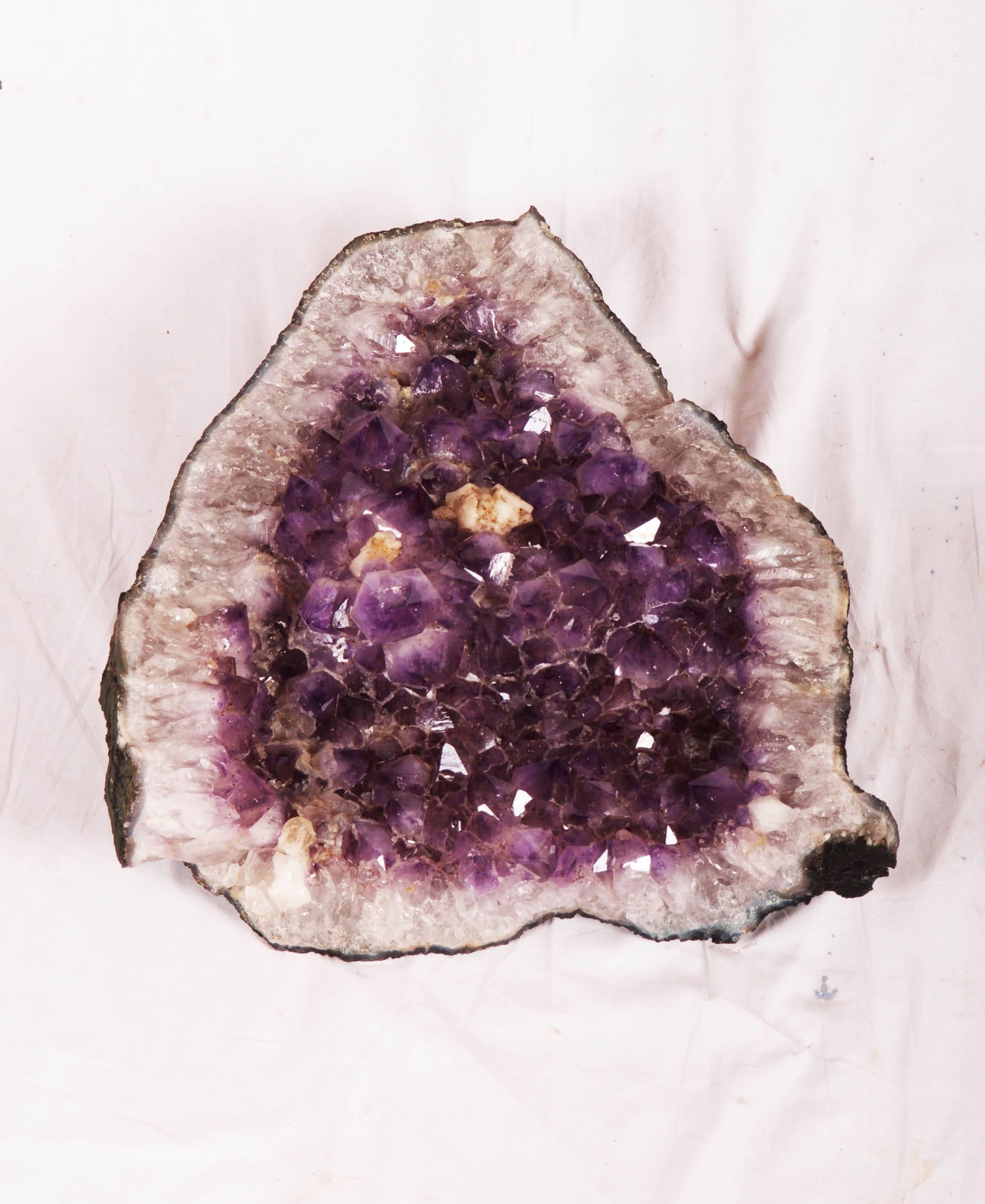 Large amethyst crystal geode, with beautiful colors and depth to the crystals.
 