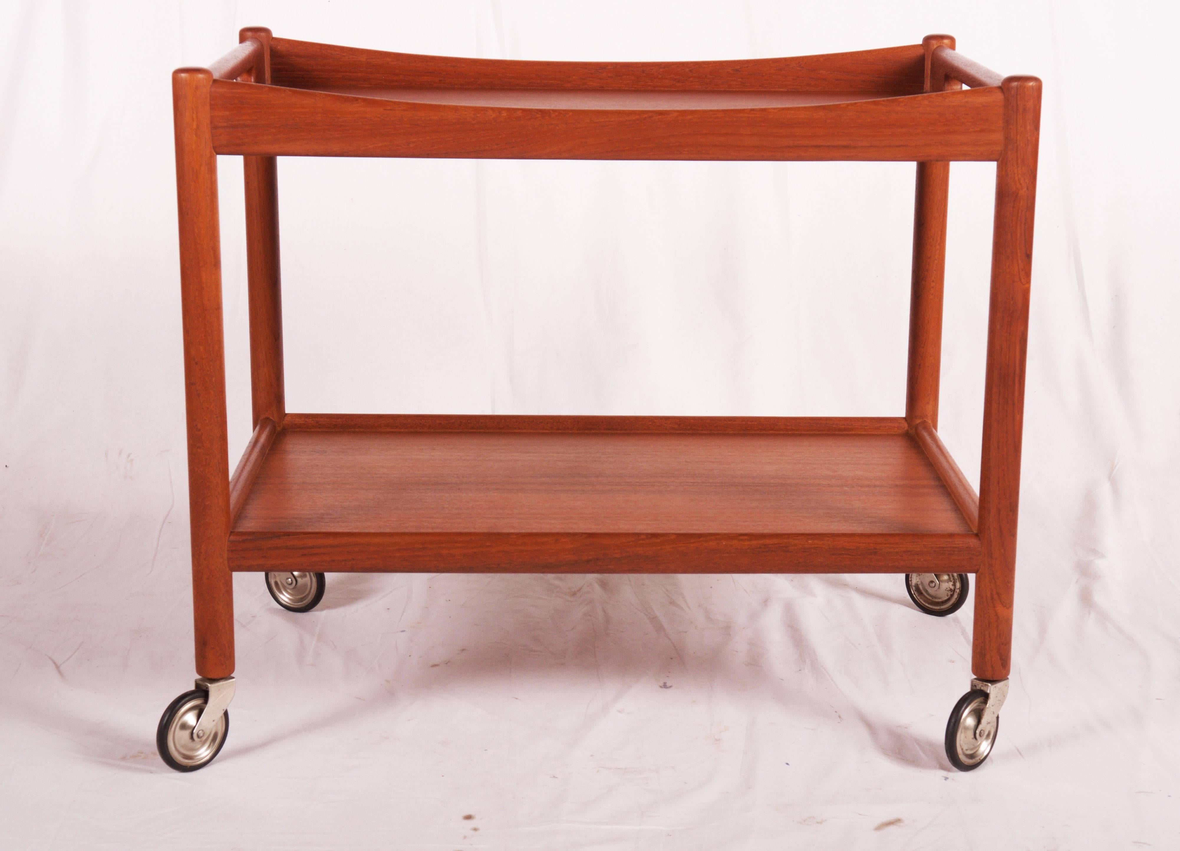 Classic and beautiful teak bar trolley model AT45 by Hans J. Wegner for Andreas Tuck, Denmark, 1960s. 
Signed on the underside.