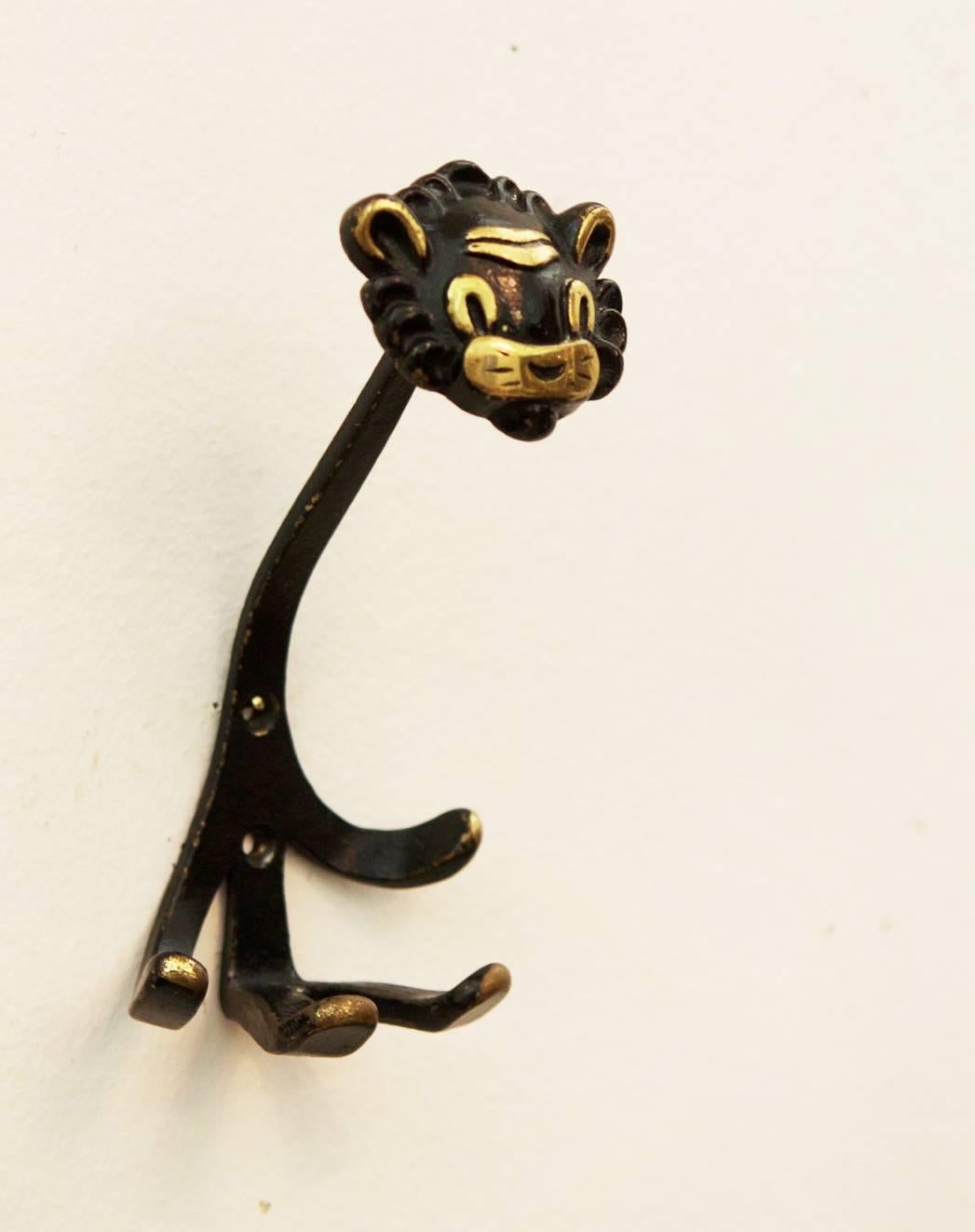 Brass hook "lion" by Walter Bosse for Hertha Baller, Vienna from the 1950s.
Used but in very good vintage condition.
Two pieces available.