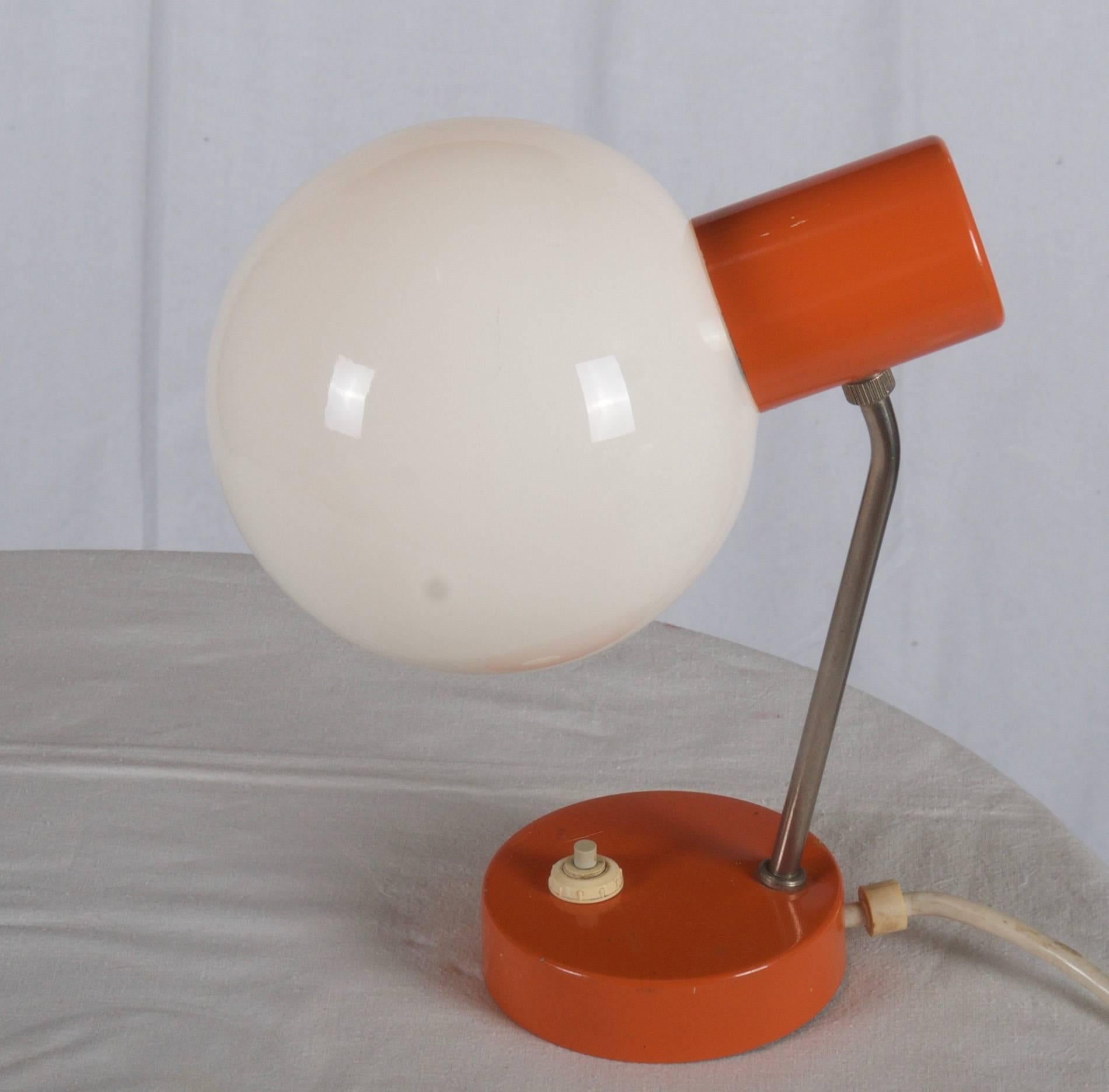 Steel orange painted lamp with chromed neck and opaline ball shade from the 1960s.