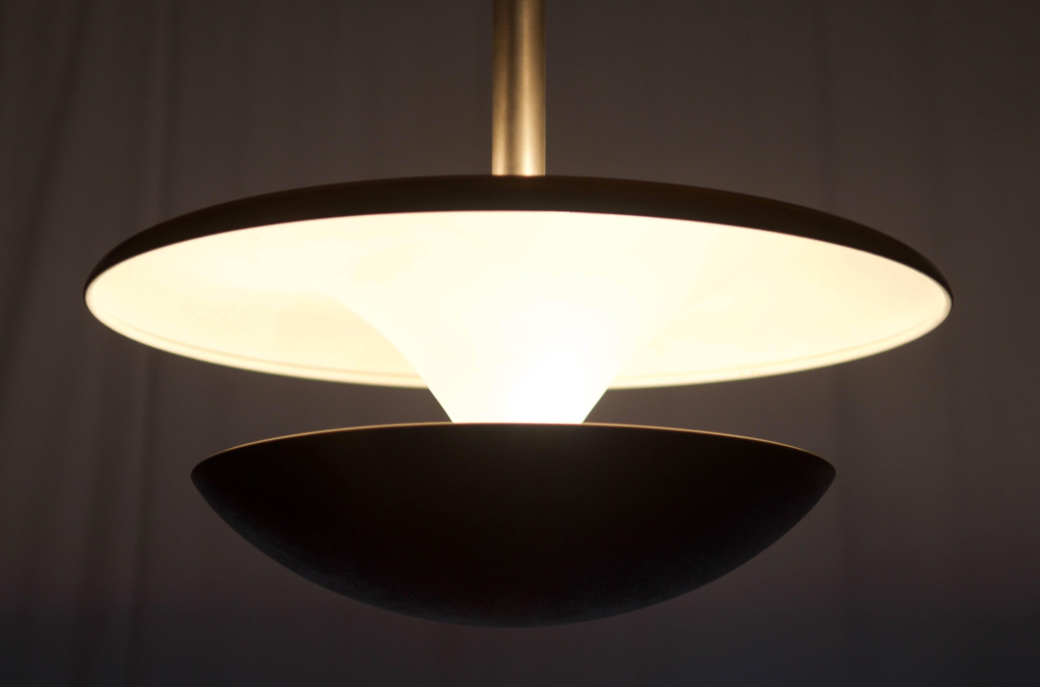 Simple and beautiful Bauhaus design for indirect lighting made in the 1930 by Franta Anýž for Napako.
Steel construction nickel-plated and enameled fitted with six E27 sockets.