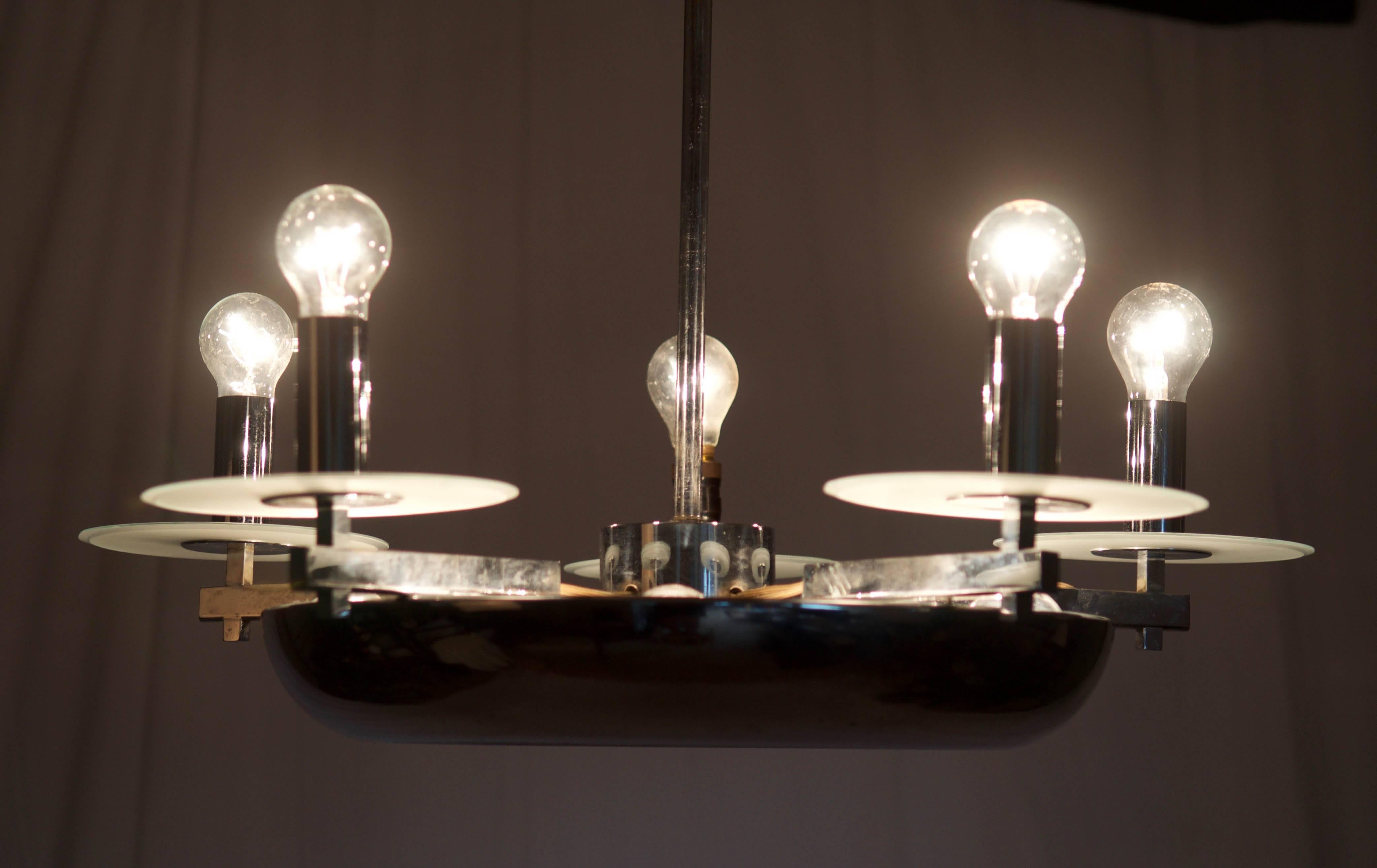 Large Bauhaus chandelier designed by Josef Hurka and manufactured by Napako in former Czechoslovakia during the 1930s. The lamp is made from nickel-plated steel and fitted with ten E27 bulbs. In a good original vintage condition.
