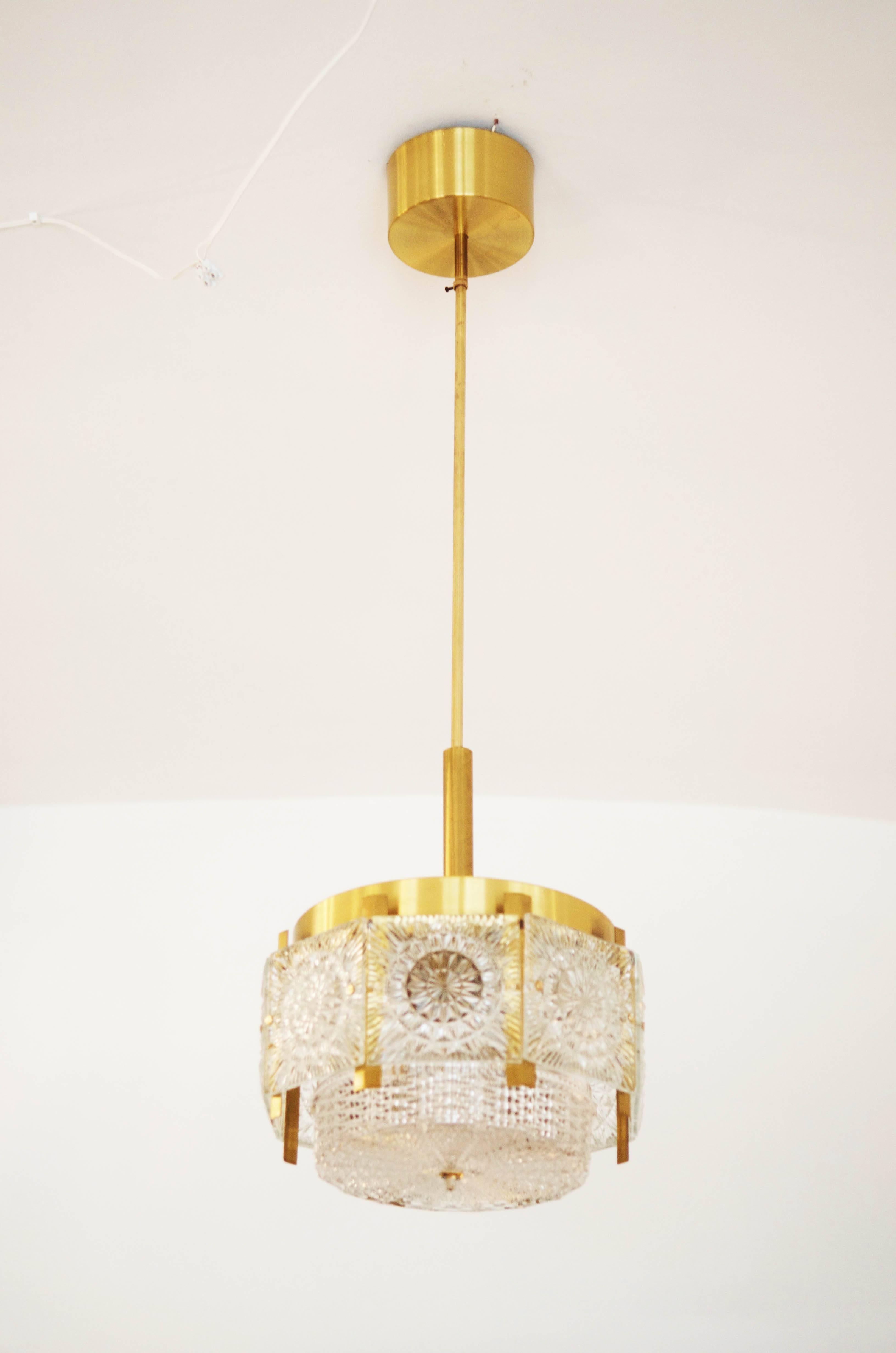 Pressed Beautiful Mid-Century Brass Chandelier For Sale