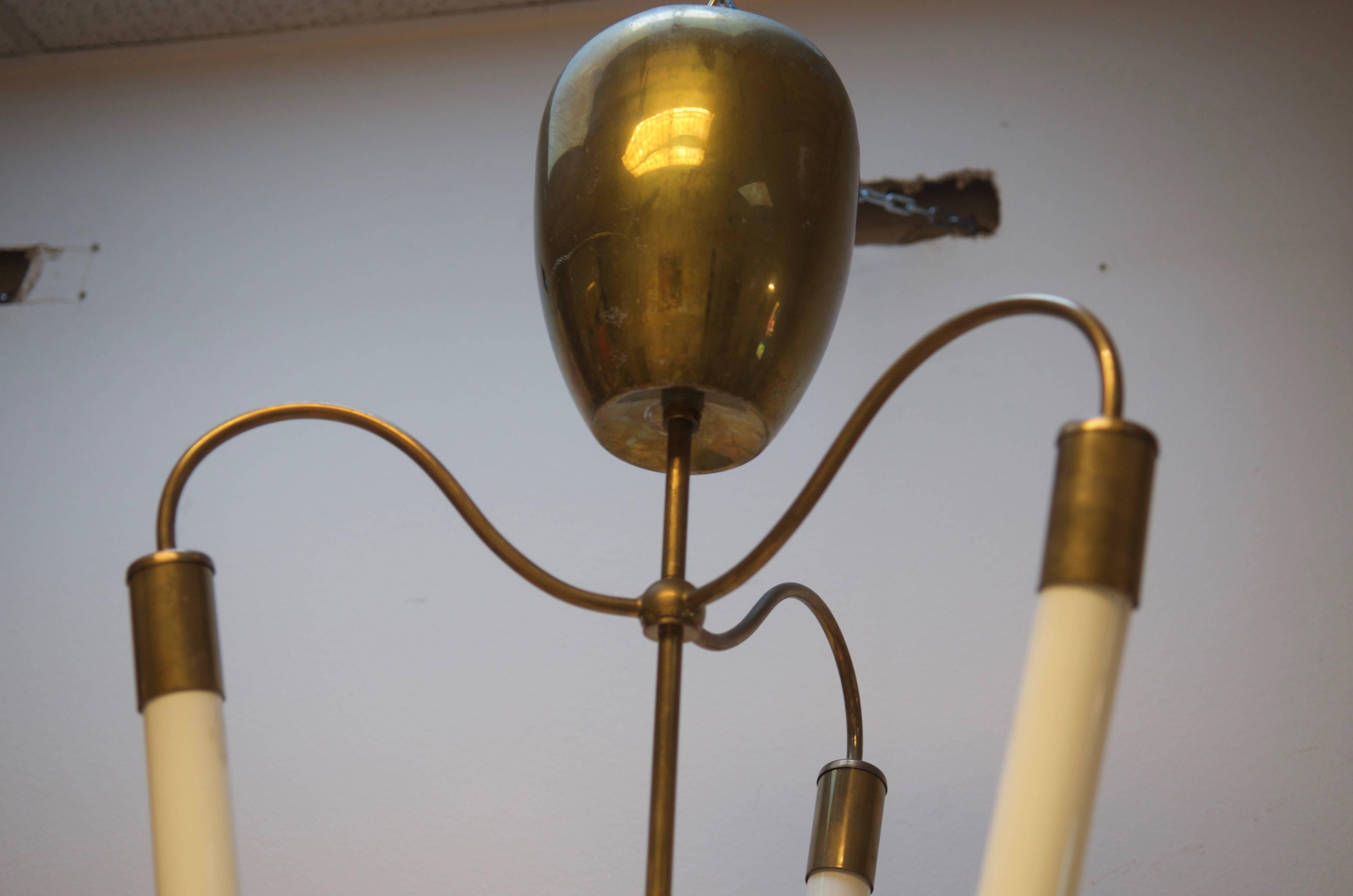 Brass construction with three neon lights made in Germany in the early 1950s. 
Now rebuild to LED Light.
