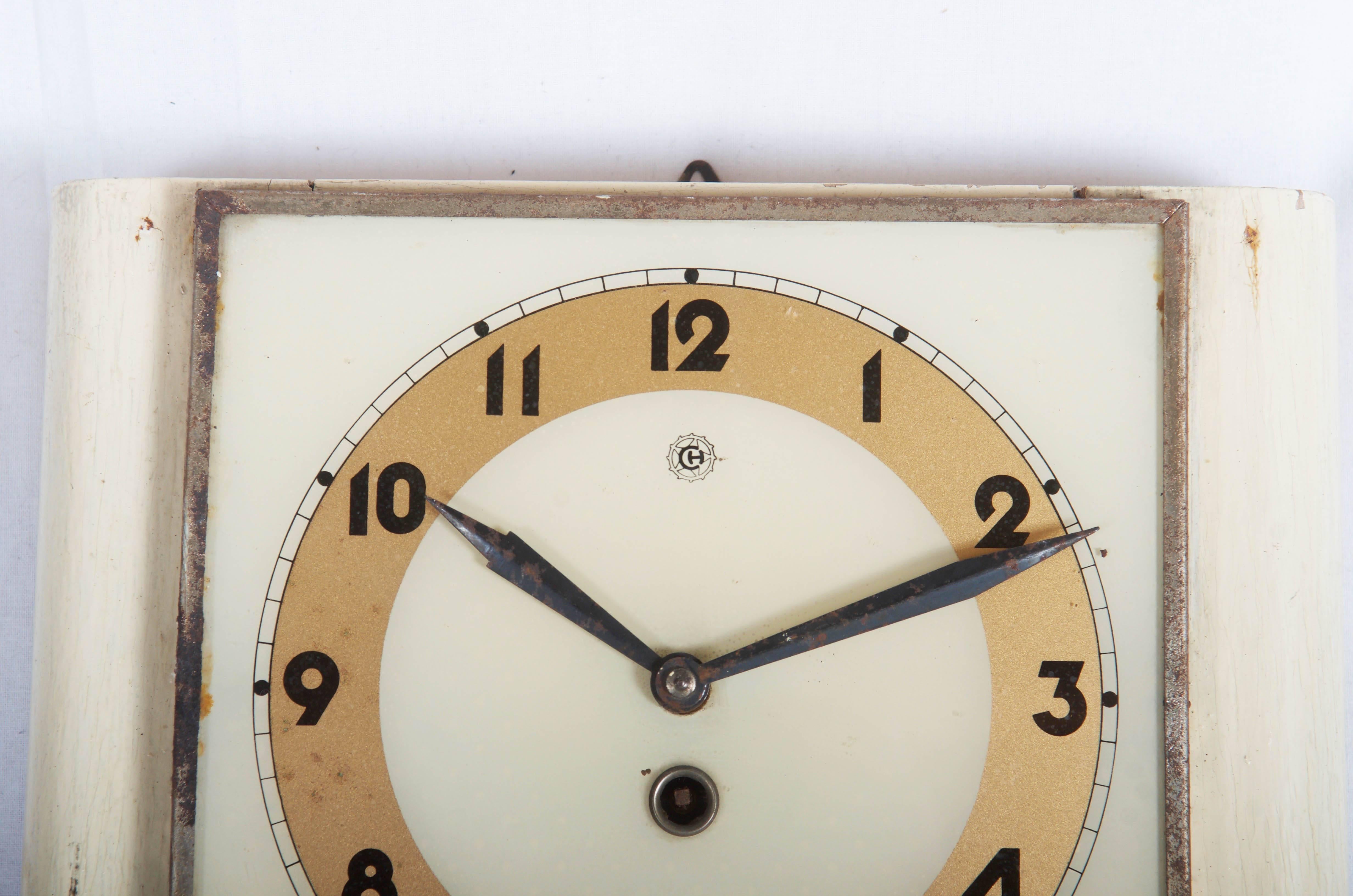 Bended plywood with a glass clock face, made in the 1930s by Chomutov (later a part of the Kienzle comp.) in Czech Republic.
Original movement was replaced to a battery movement. 
Delivery time about 2-3 weeks.