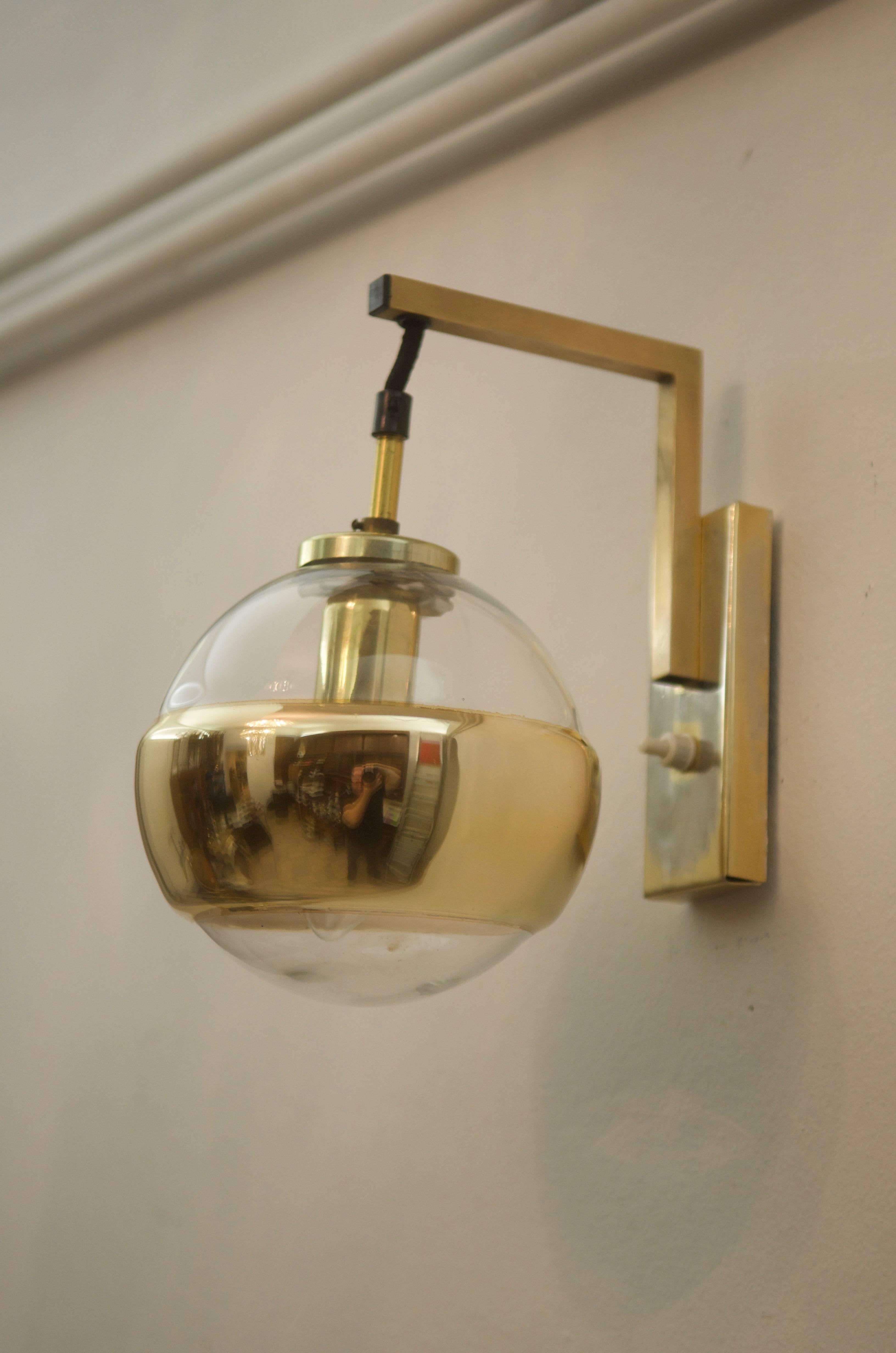 Steel frame with glass globe with gold strip fitted with one e14 socket.
Made in Germany by Peill & Putzler in the 1960s.
   
  