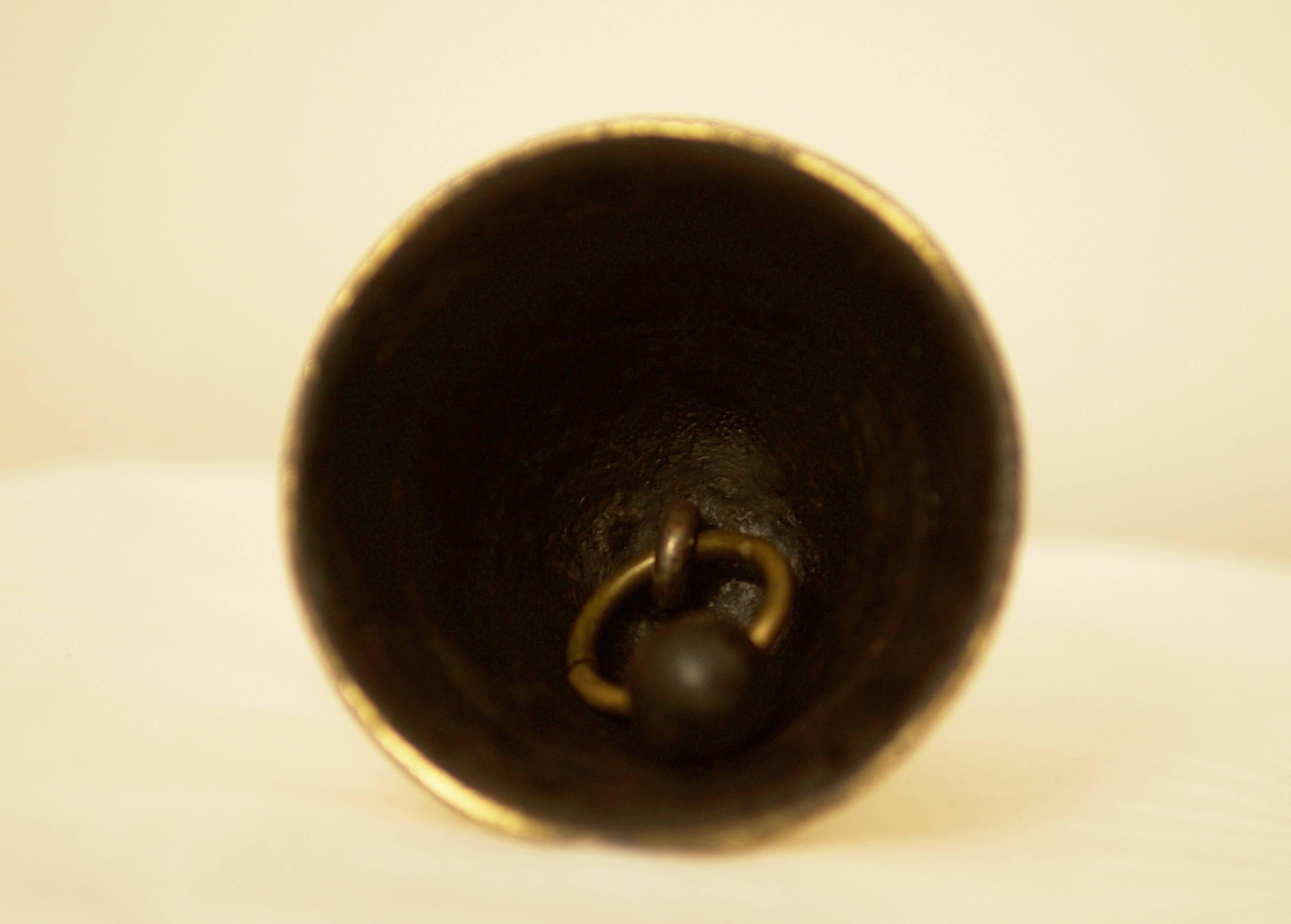 Solid brass partially blackened, designed by Walter Bosse for Hertha Baller in the 1950s.