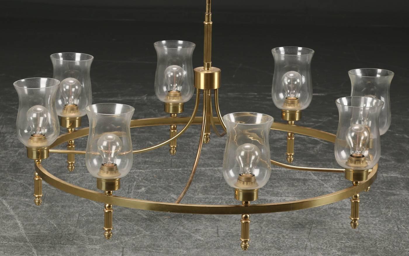 Large hall chandelier by Svend Mejlstrøm from the 1960s.
Brass construction fitted with eight E27 sockets and hand blow clear glass shades.
Signed Mejlstrøm lighting.
Dimensions: H 265 cm, Ø 90 cm.