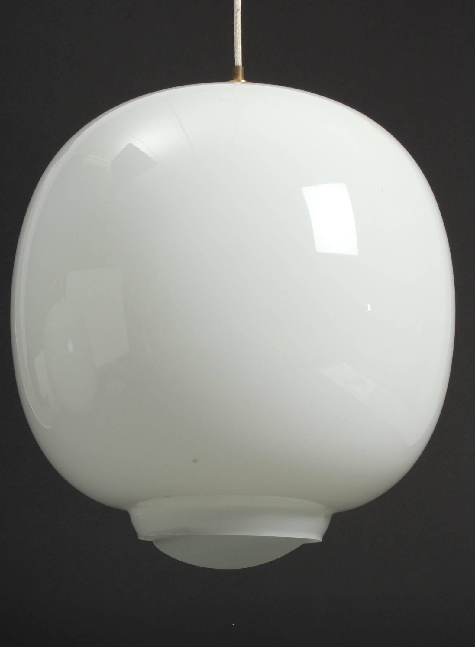 Large Radiohus pendant white opal glass with frosted glass and brass mounting elements. Designed by Vilhelm Lauritzen for Louis Poulsen, 1940s. 
Dimensions: 
H 37, Ø 36 cm.
