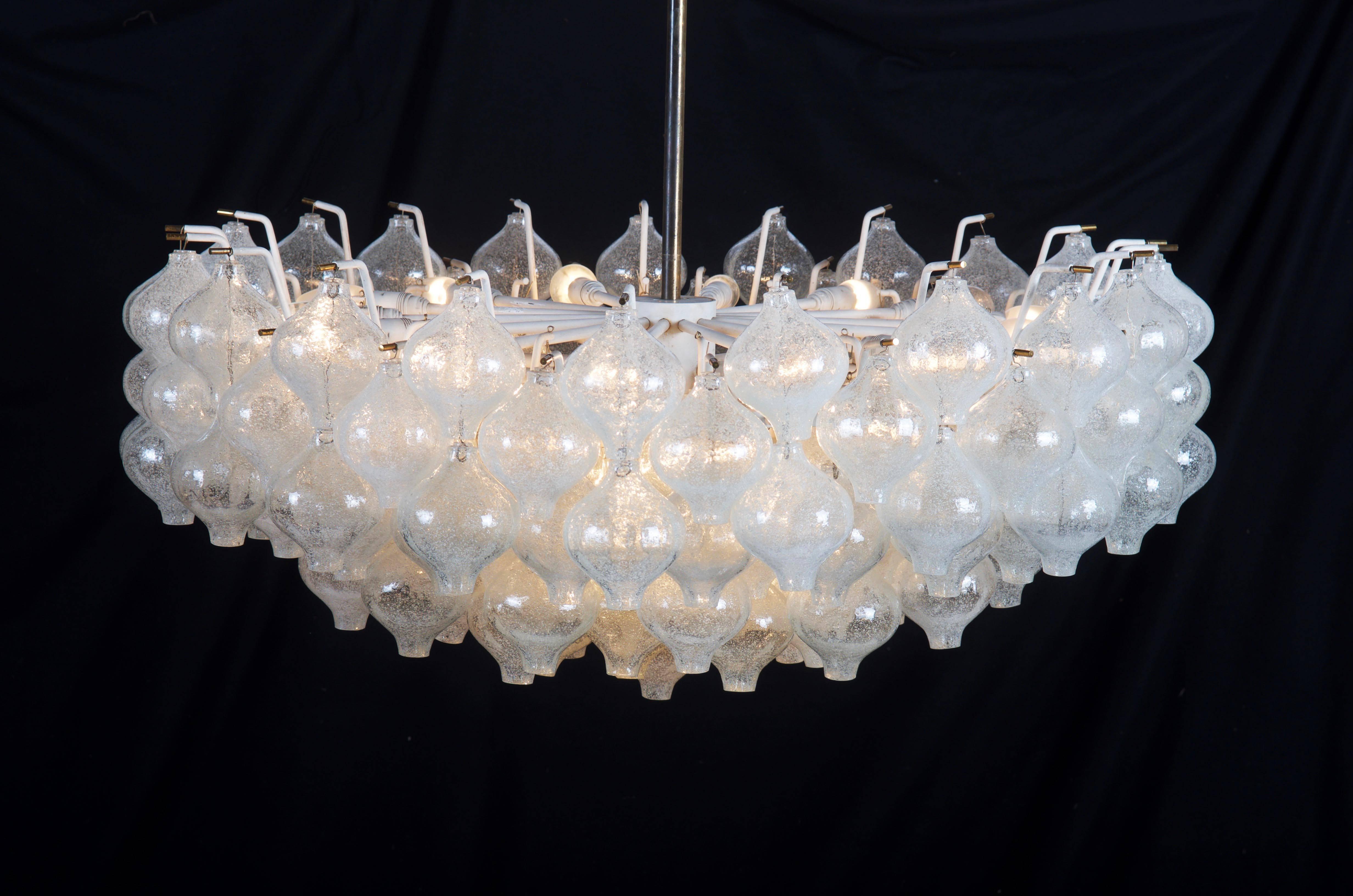 Imposing chandelier manufactured by Kalmar in Vienna in the 1960s.
Brass frame white enameled with 155 handblown art glass balls. Fitted with 28 E14 sockets up to 40W each. Original condition with some patina on steel parts, electric has to be