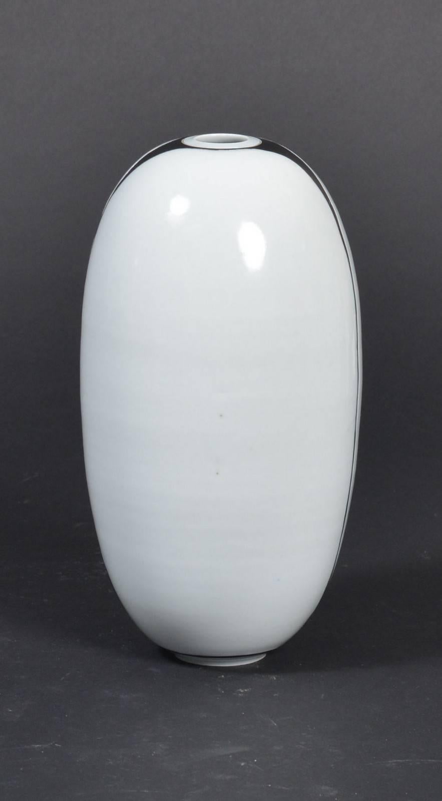 Large vase, porcelain, minimalistic decorated, signed at the bottom. Made in Denmark in the 1970s.