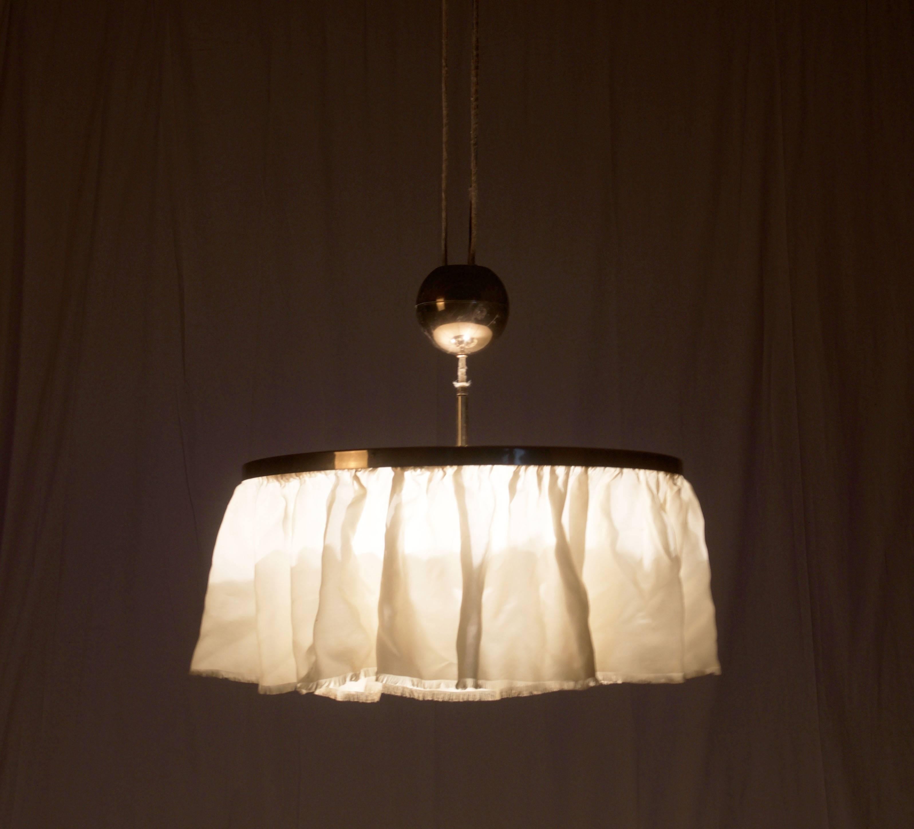 Brass with silk lampshade, originally designed by Adolf Loos and produced in the 1960s by J.T. Kalmar.