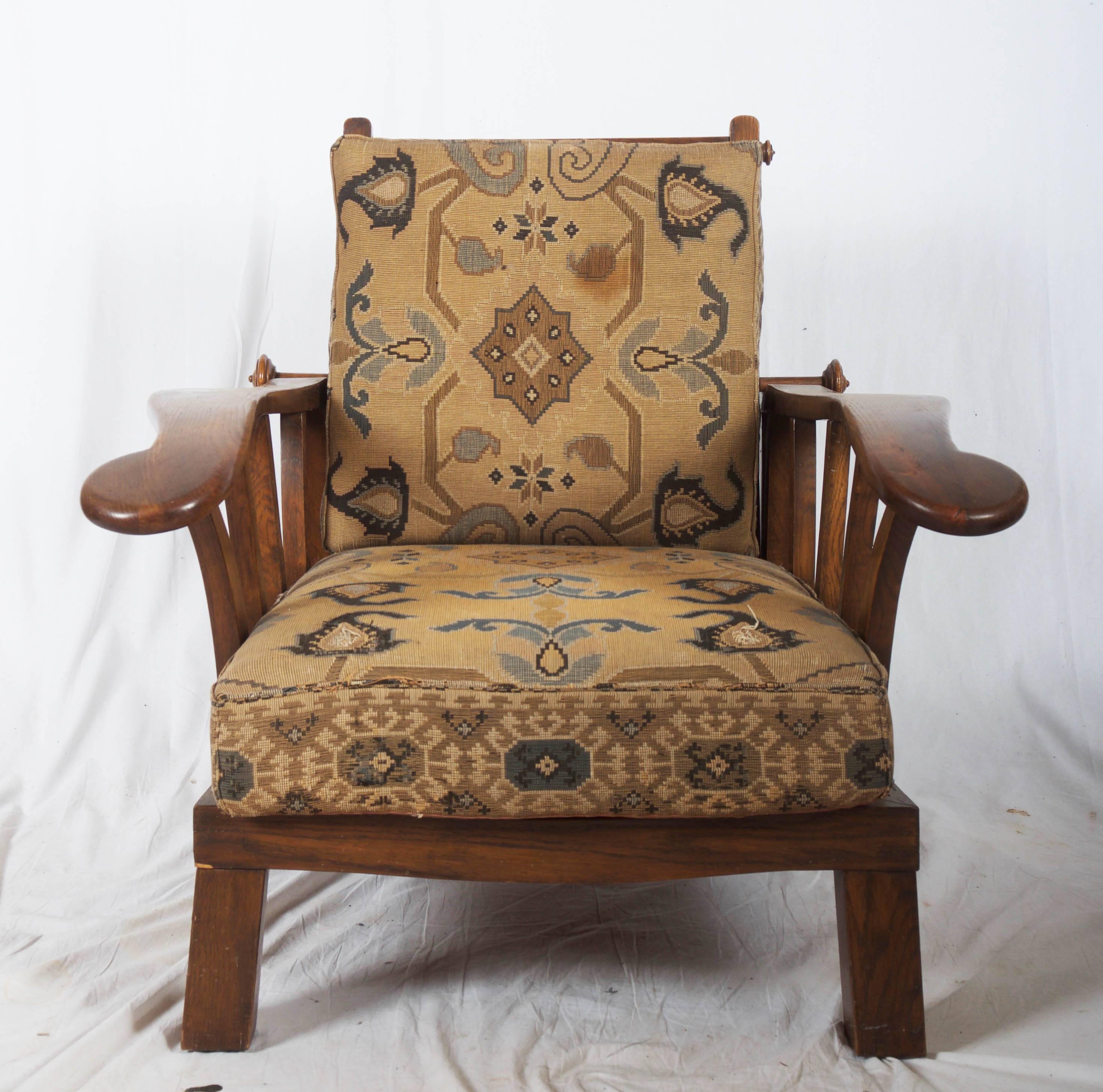 early Art Deco armchairs from the 1920s. Oak construction with adjustable backrest. 
Complete professional restoration / upholstery on request possible. Up to two pieces available

 