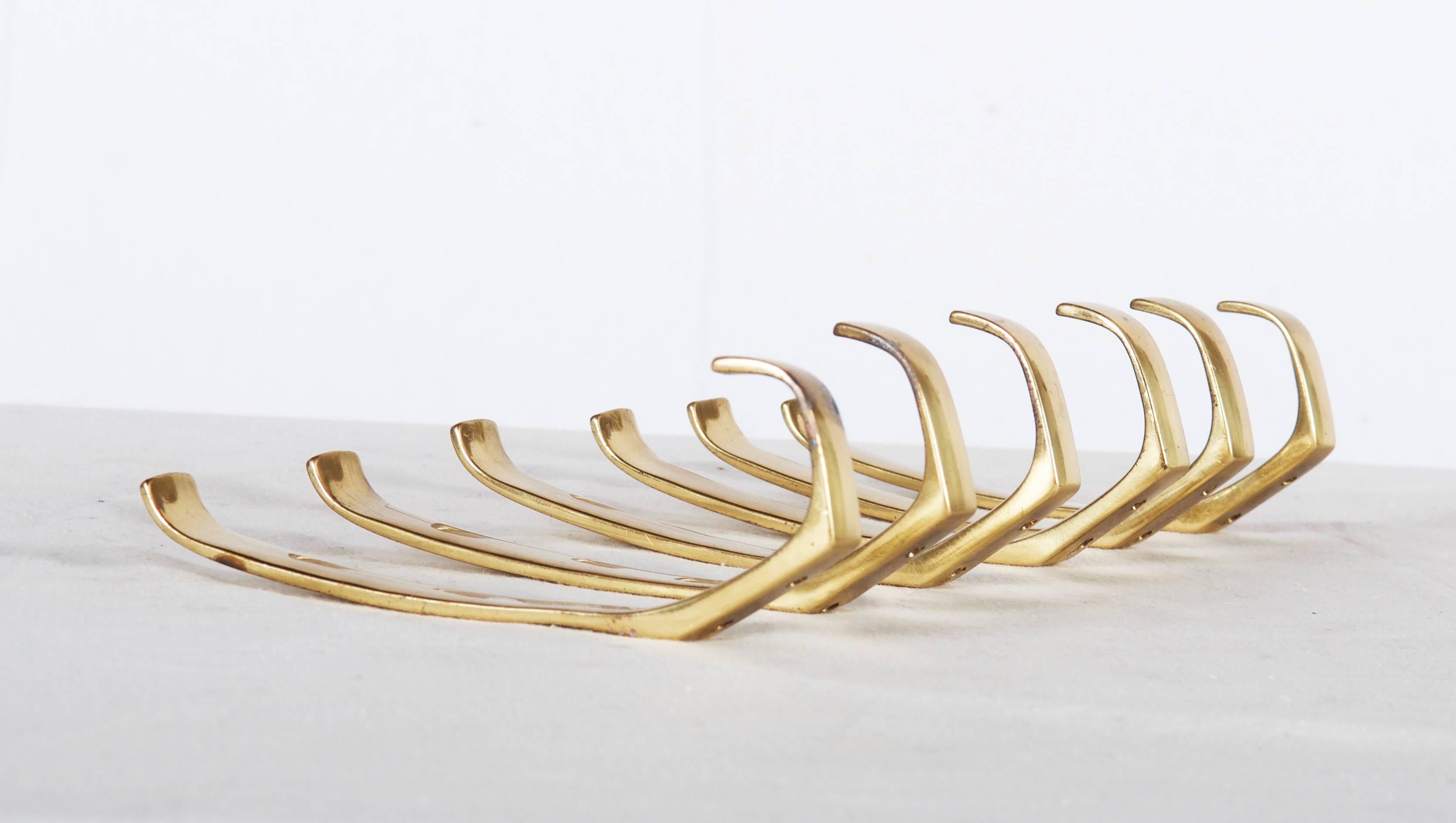 Brass coat, hat hooks, elegant shape and perfect quality by Hertha Baller from the 1950s.
    