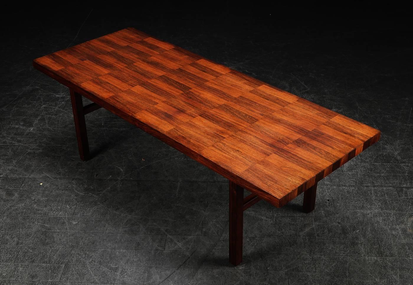 Hardwood patchwork coffee table designed by Bramin Møbelfabrik. The table is in very good vintage condition.