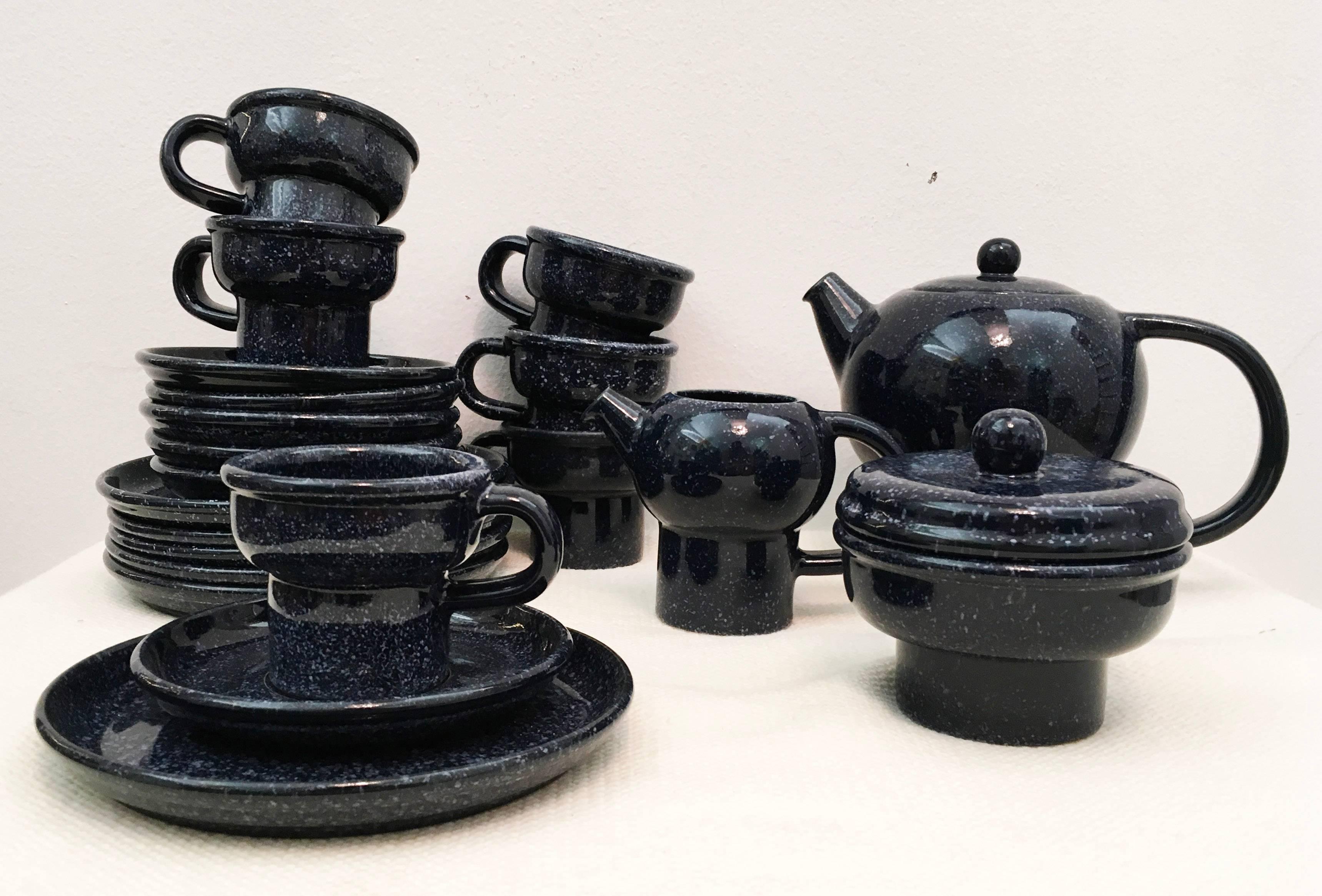 Stoneware pottery cafe set designed in the 1970s by Carl Auböck for Ostovics. Anthracite/blue glaze. Excellent original condition.
   