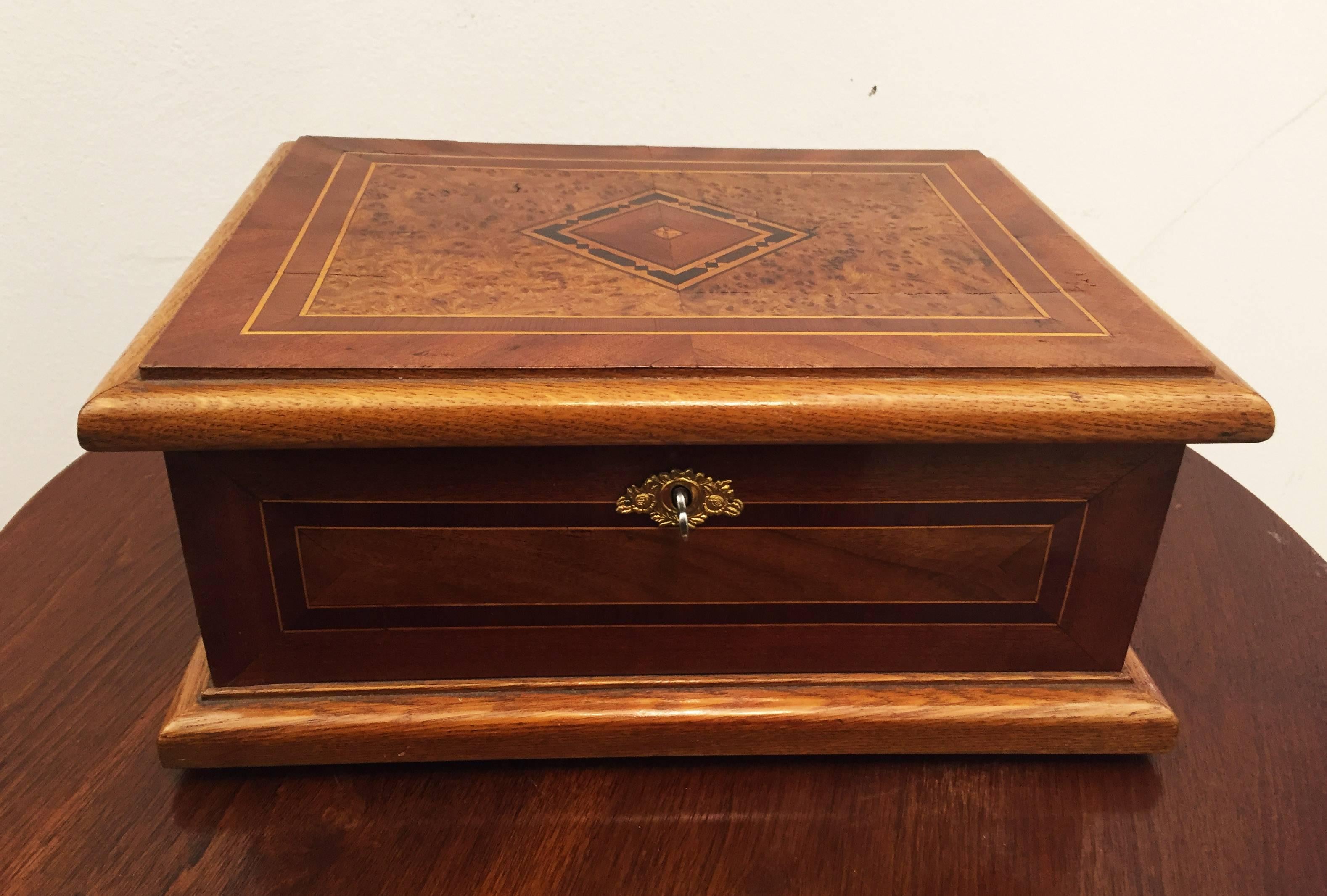 Wooden box with beautiful marquetry work made in Vienna in 1924.