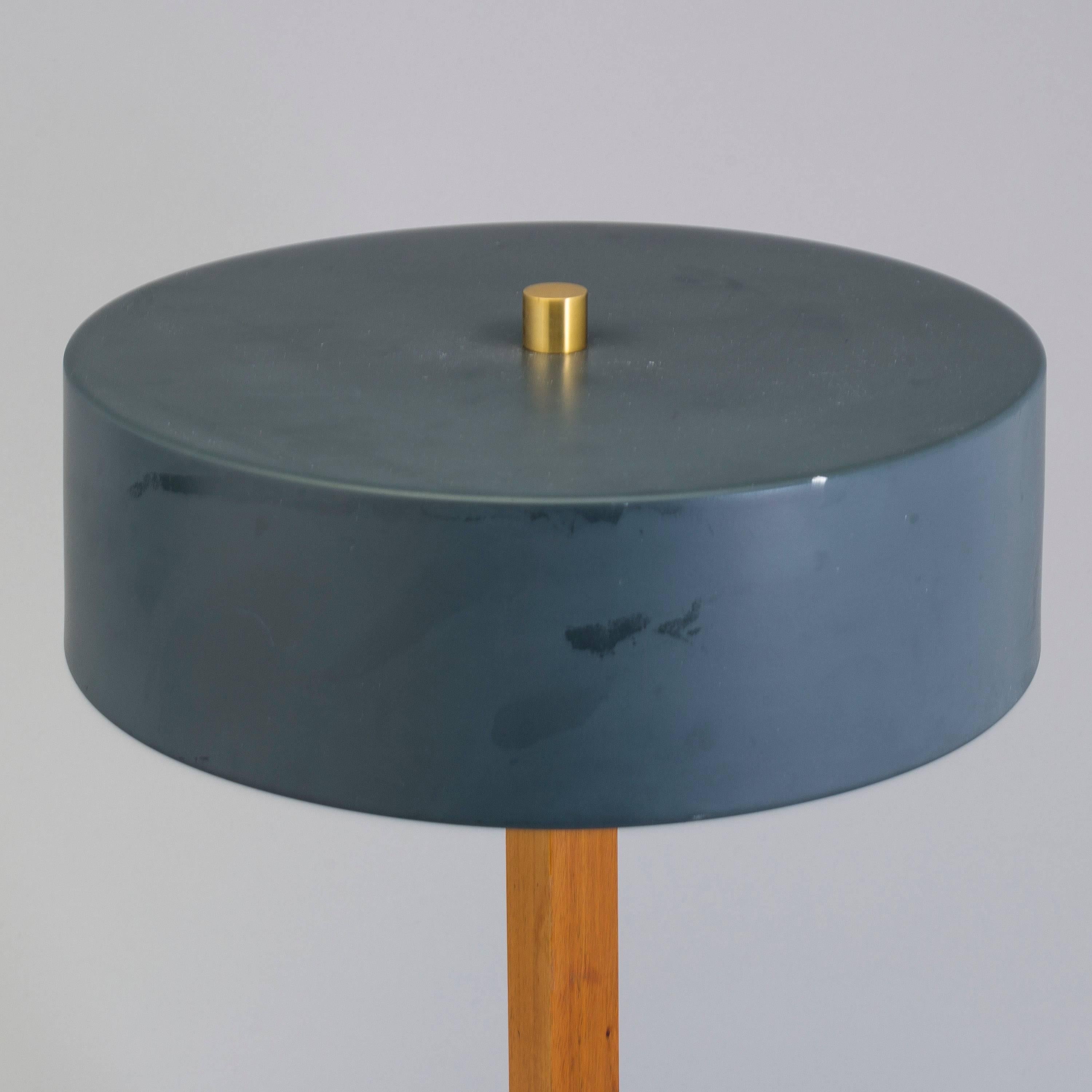 Brass construction with aluminum shade blue painted. Designed 1940s by Einar Backstrom.
2 pieces available