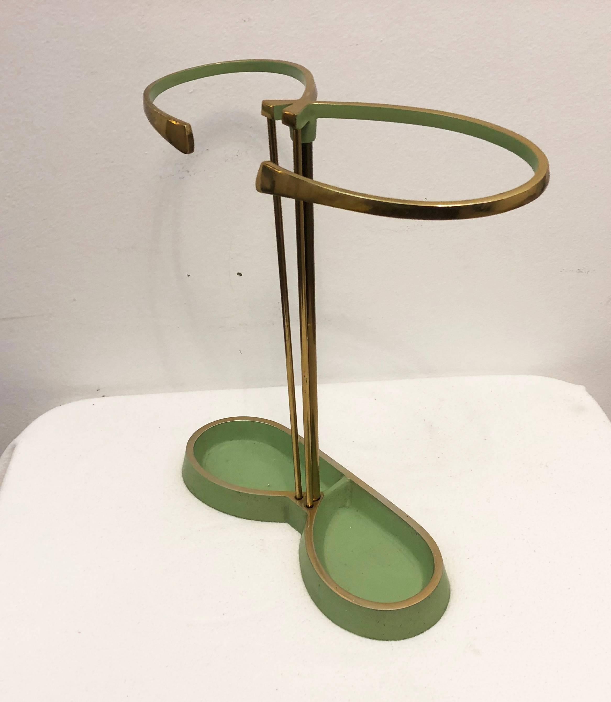 Mid-Century brass/aluminum partially green painted umbrella stand from the 1950s.