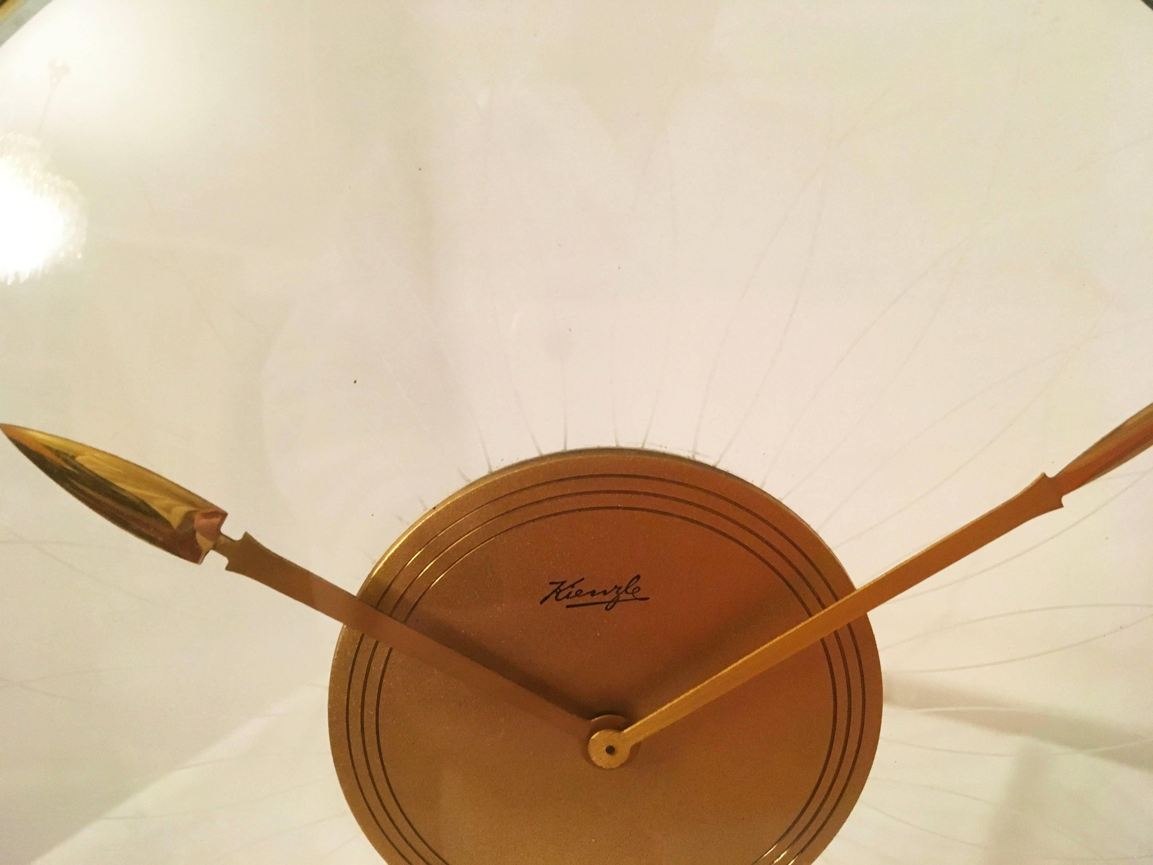 Kienzle table clock from the 1930s designed by Heinrich Möller.
Brass with glass construction fitted with a mechanical movement.