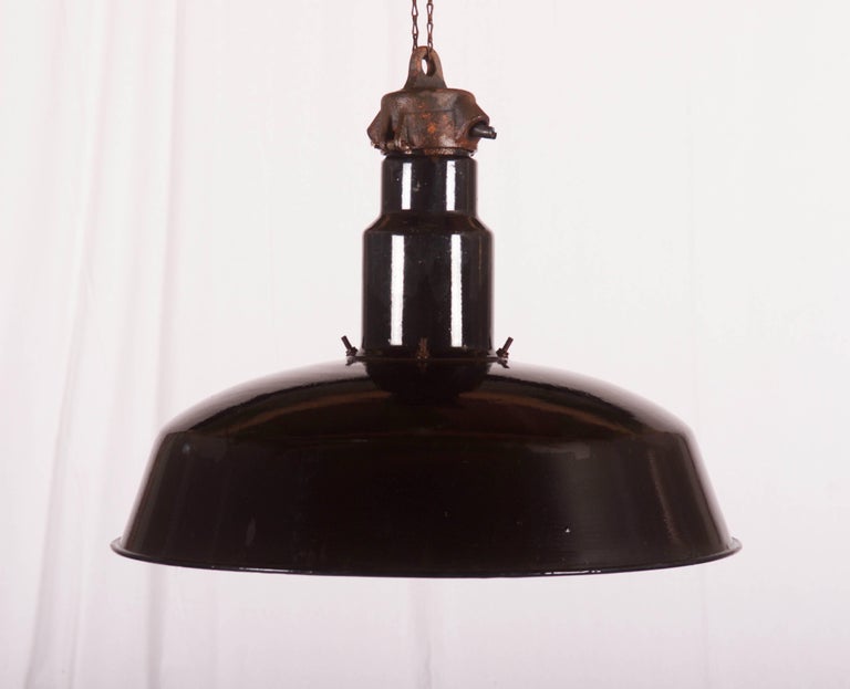 Czech Industrial pendants with black / white enameled steel screen from the 1950s.
Dimensions:
Height approximately 46cm, Ø 52 cm.
On request several pieces available.