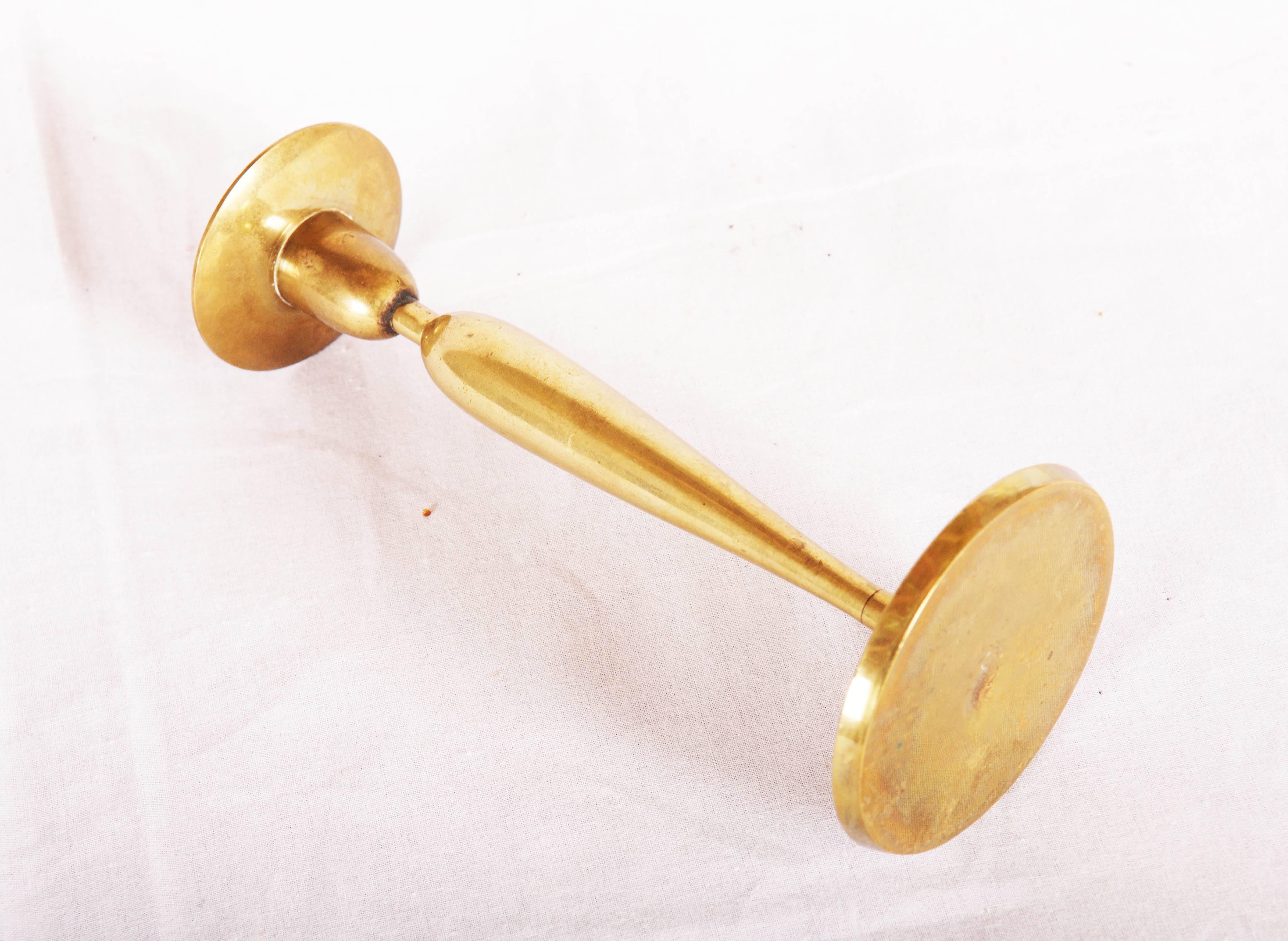 Brass candlestick by Hagenauer Vienne from the 1930s.