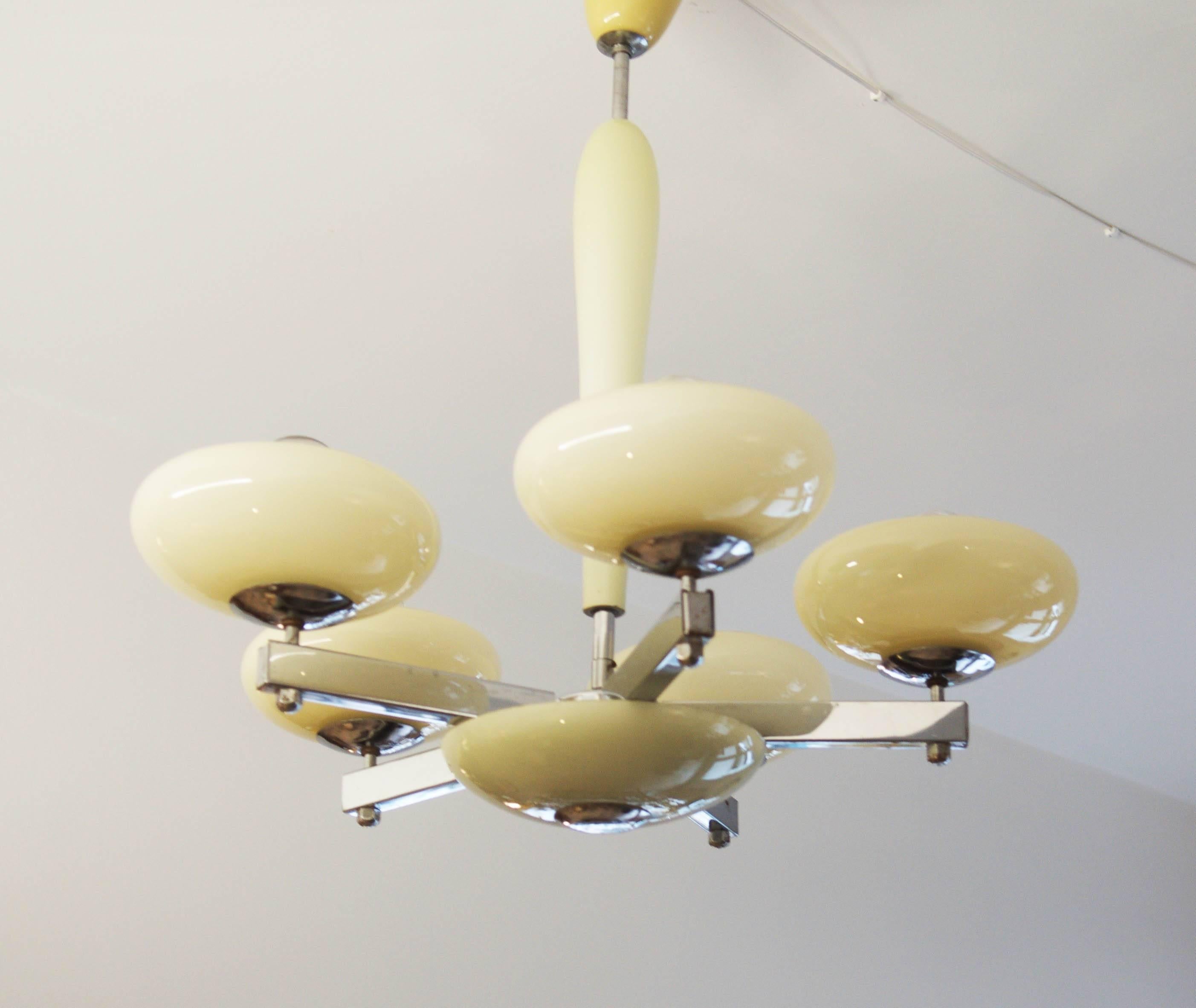 Chandelier form the 1930s.
Brass construction chromed with five E27 sockets.