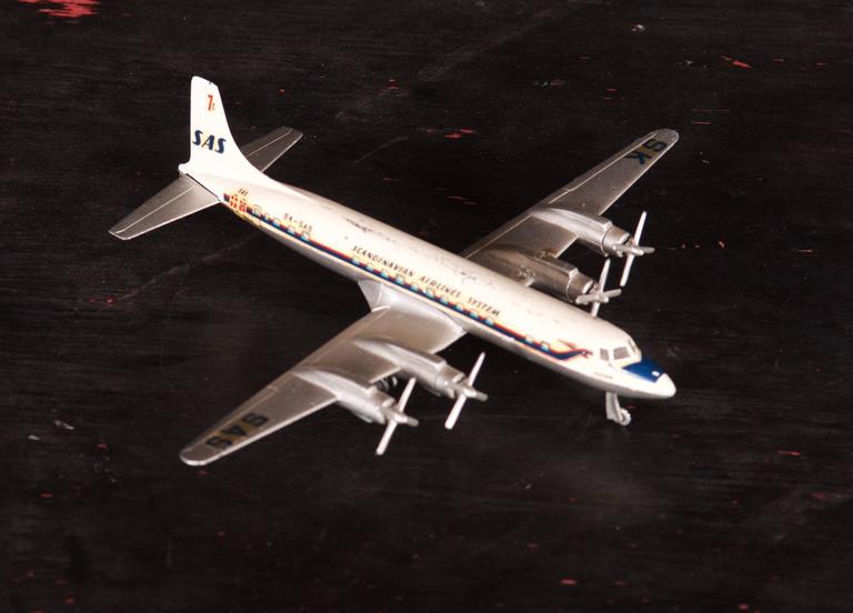 Steel Vintage Douglas DC 7 C Airplane Model For Sale