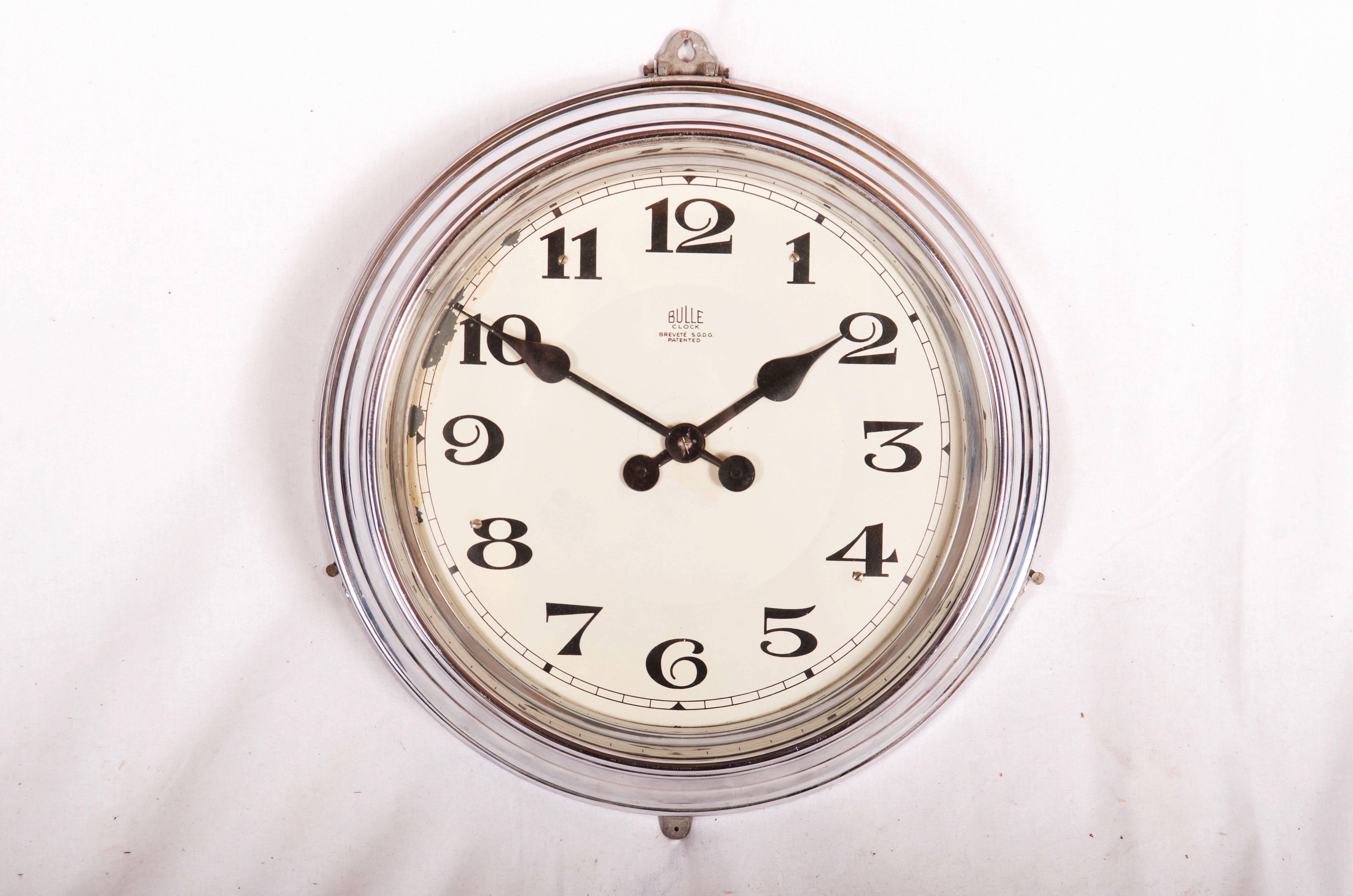 This clock was produced in the years 1920s by Bulle Clock in France.
Patented in France by Maurice Favre-Bulle and Marcel Moulin.
Bulle clocks have pendulum impulse, which swings over solid three-pole magnet.
Compared to other electric clocks of