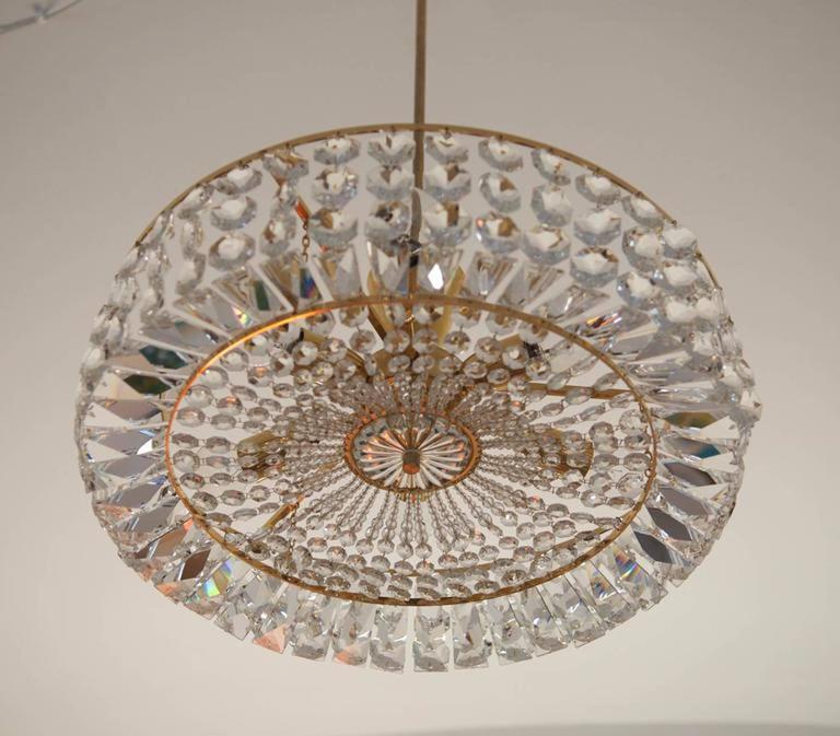 Lustre en verre soufflé et pincé transparent garni de cristaux, autriche vers 1920