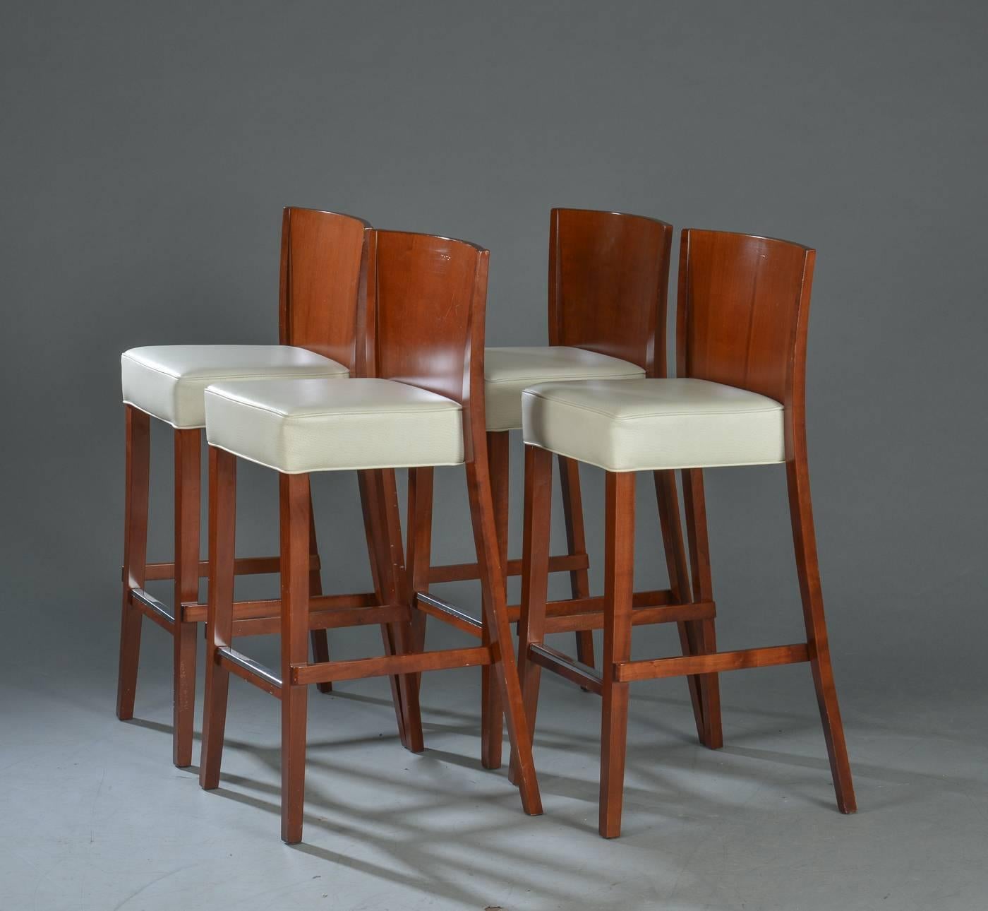 Philippe Starck for Driade. Four bar stools from the series 'Neoz' with lacquered wooden frames and seats covered with white leather. Measure: SH. 75 cm
Up to four available.